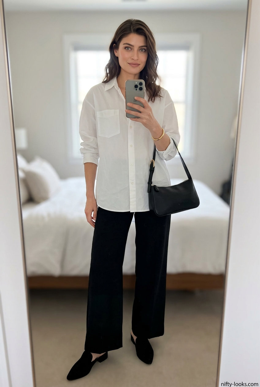 Beige flowy summer wide leg pants outfits 2026 with white shirt, black mules, and shoulder bag.