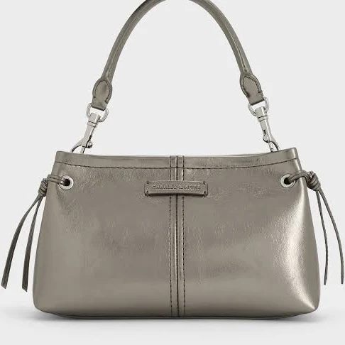 bag Charles & Keith Noane Metallic Top Handle Bag charleskeith.com $99