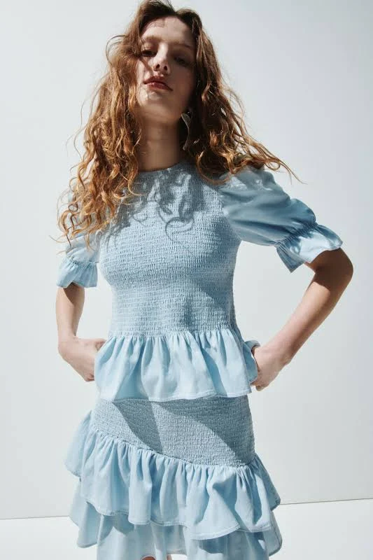 off-shoulder top H&M Ladies Smocked Denim Blouse H&M $29.99