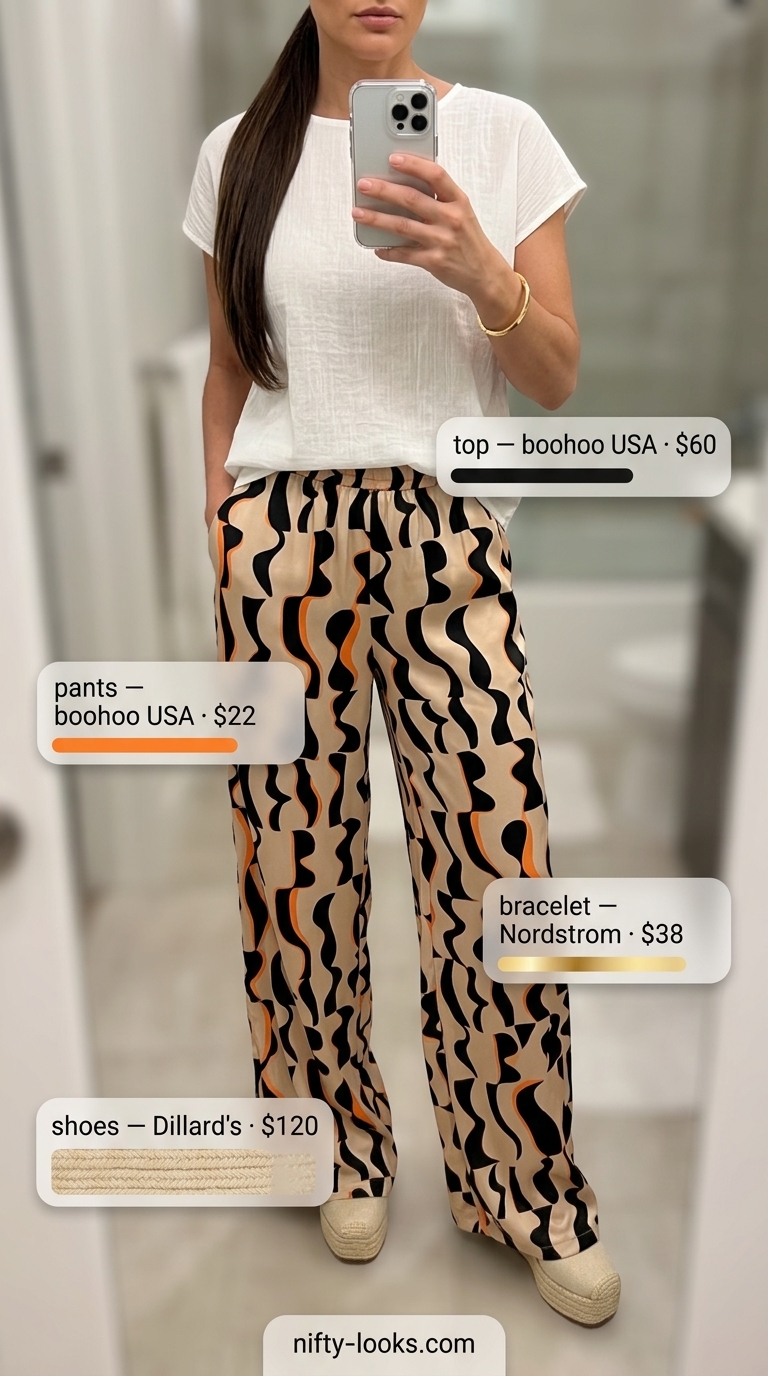 Stylish summer abstract print outfits for women 2026: Orange abstract print wide-leg pants with white crop top.