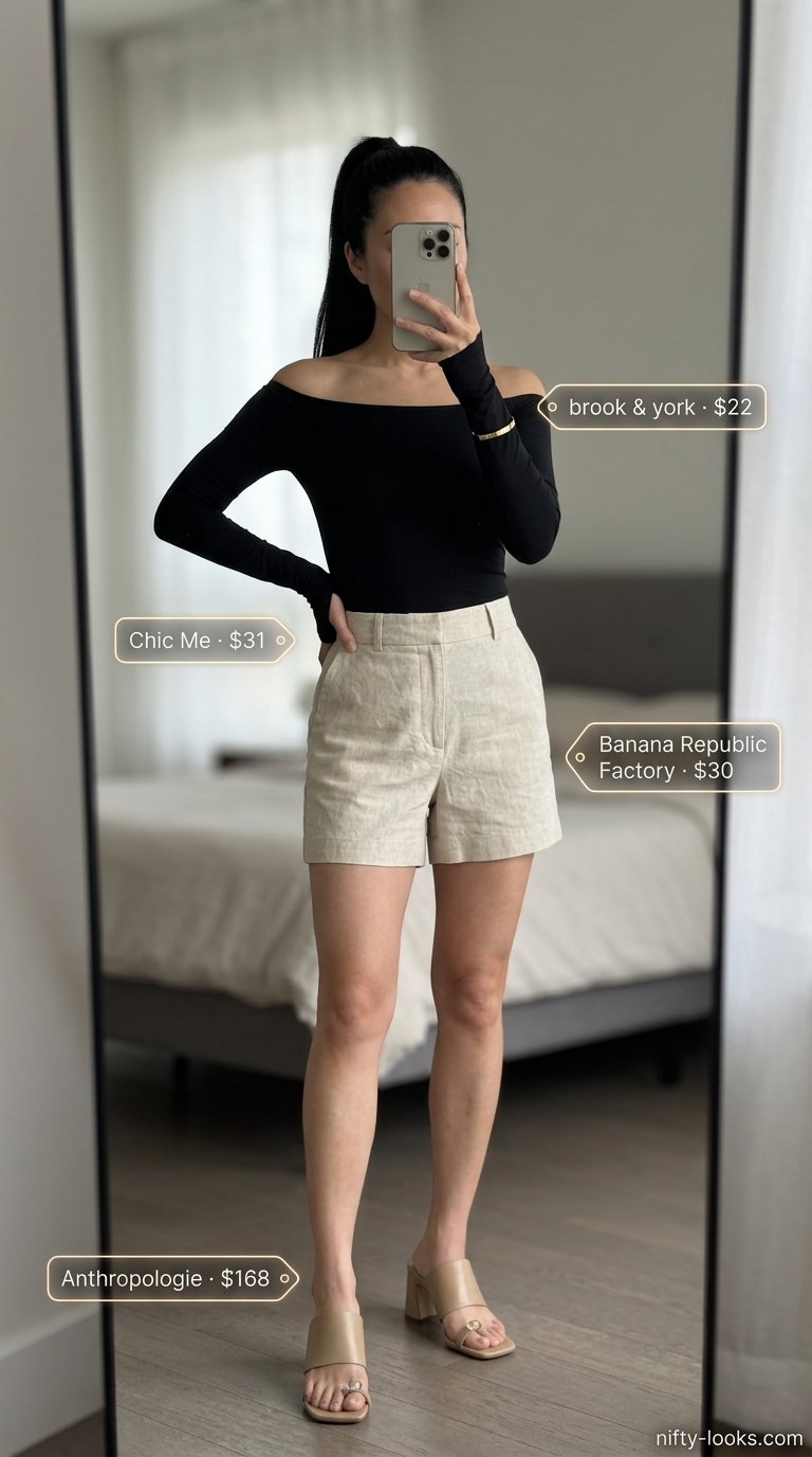 Chic black off-shoulder top with linen shorts, leather belt bag, and gold jewelry for vacation.