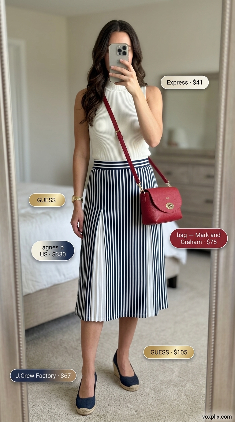 Navy and white striped pleated midi skirt outfit 2026 with mock neck top and espadrilles for a nautical lunch.