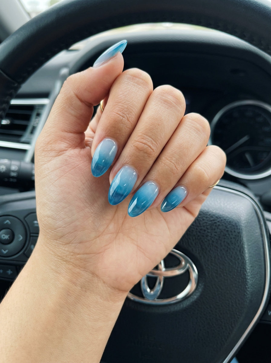 Cute summer nails 2026: Ocean Blue Jelly Ombre on medium square nails for vacation & relaxed outings.