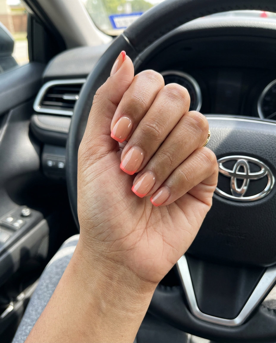 Cute summer nails 2026: Sun Kissed Orange Micro French tips on sheer nude base for summer brunch.