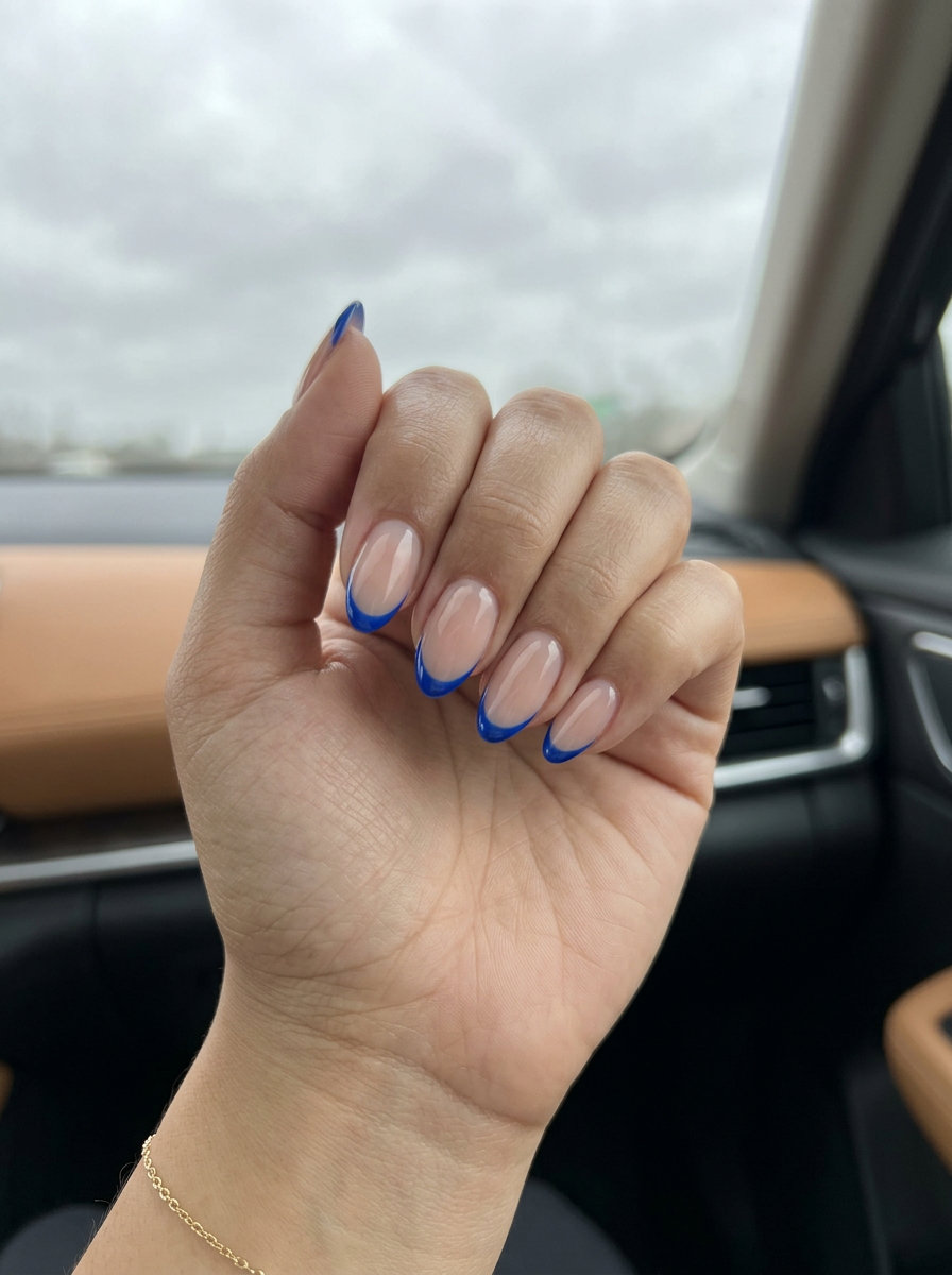 Cobalt Blue Micro French Almond Nails 2026 Cobalt Blue Micro French Almond nails: Edgy date night look with nude base & vibrant blue tips. Summer trends 2026.