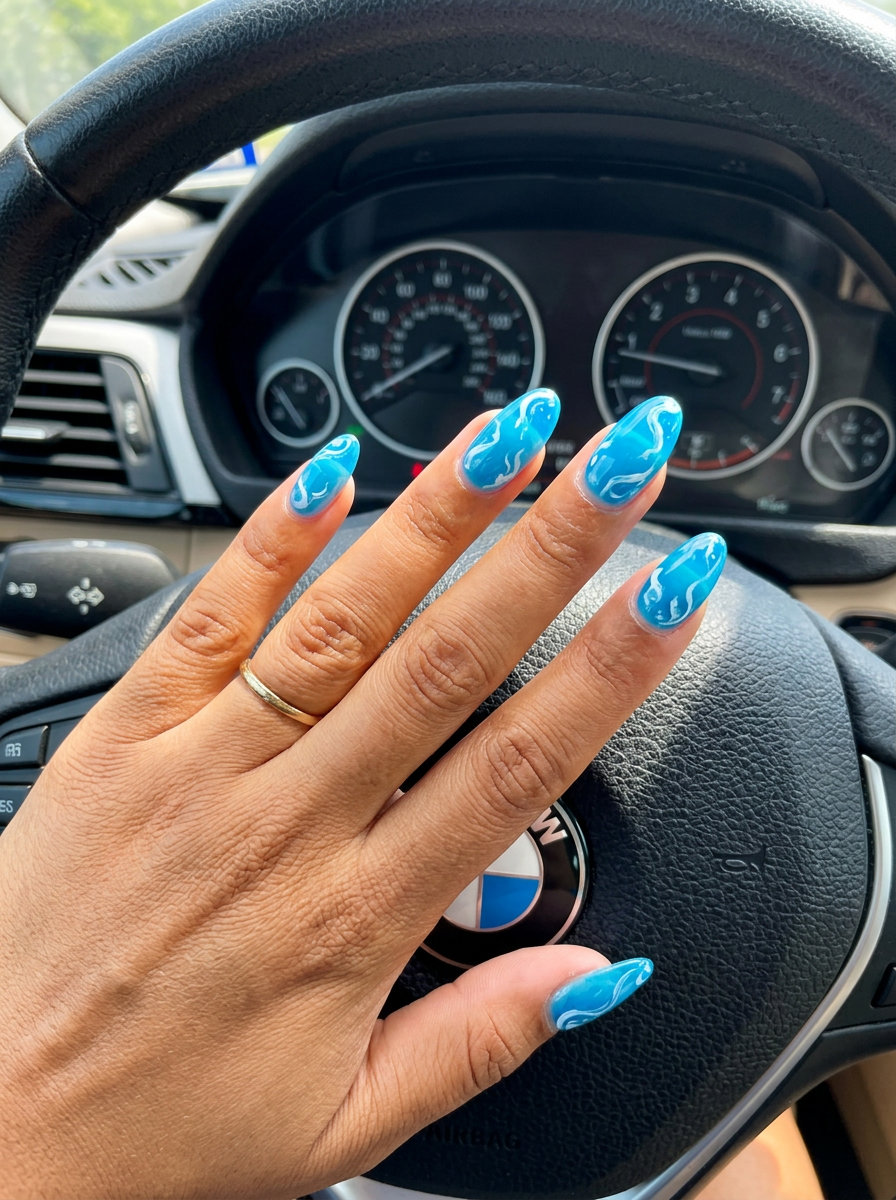 Aqua jelly swirls oval nails for summer vacation, beach trips, and casual outings. Oval summer nails 2026.