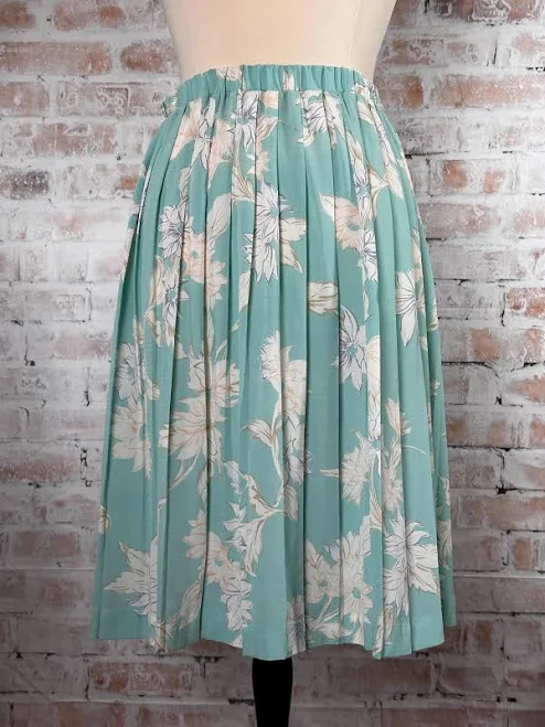 skirt True Vintage 1970s Devon Women's Teal and White Tropical Floral Print Stretchy Elastic Waist Pleated Below-the-Knee Length Flowy Midi Skirt Etsy - Seller $35