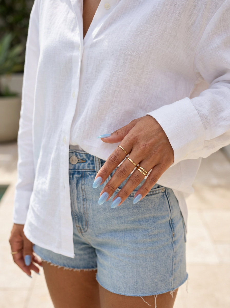 Baby blue jelly soft coffin nails for vacation vibes. Simple summer acrylic nail designs 2026.