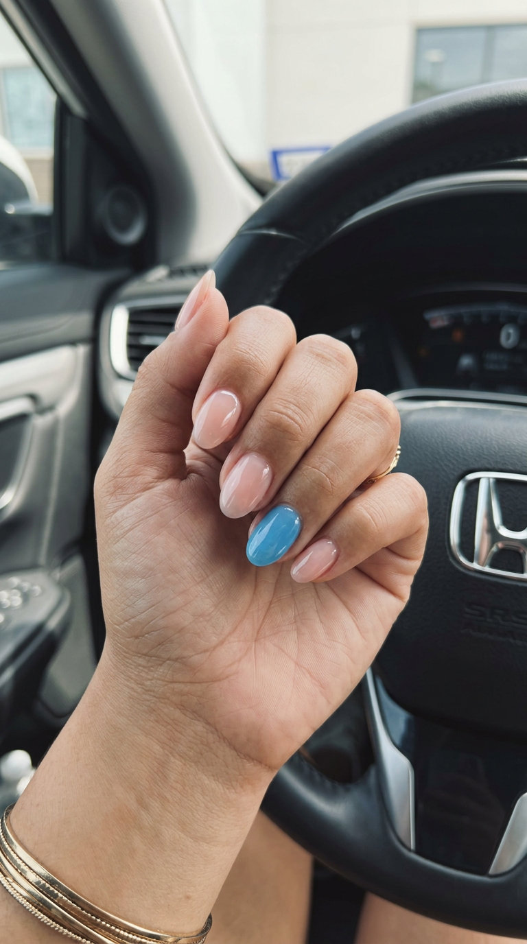 Baby blue jelly accent nail oval for vacation or casual wear. Whimsical and refreshing style.