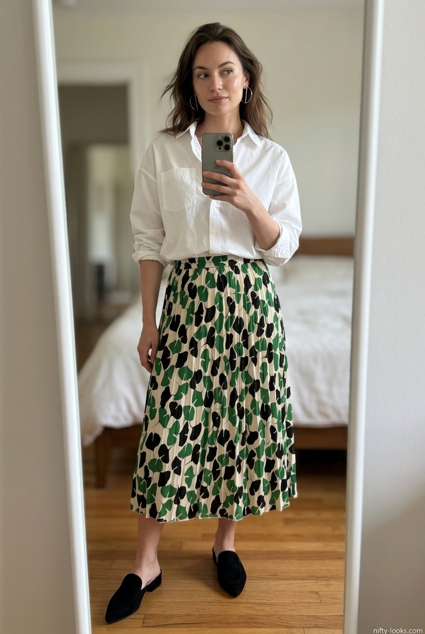 Modern green abstract floral midi skirt outfit with white button-down for creative workplace or brunch. Summer Floral Skirt Outfits for Women 2026.