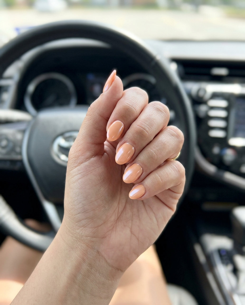 Apricot Glazed Donut nails: soft apricot with pearlescent sheen for summer fruits nail art 2026.