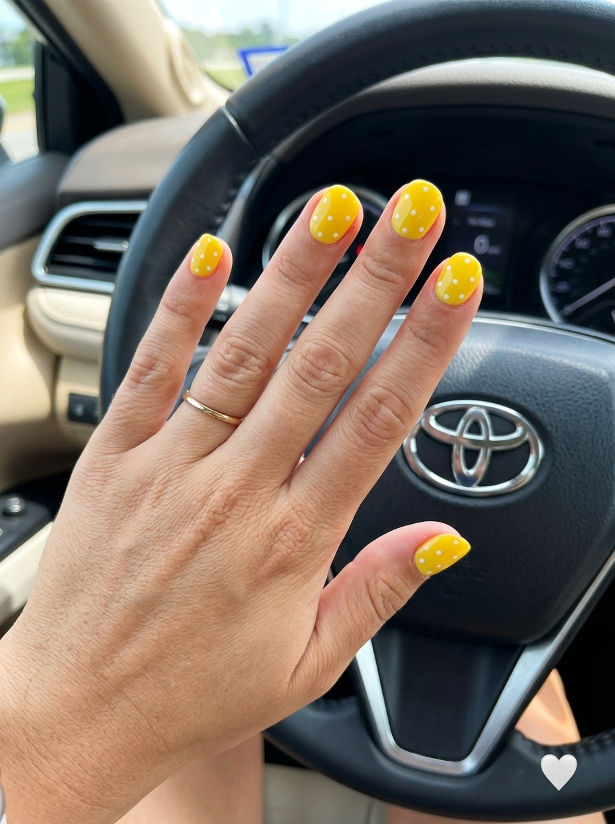Canary Yellow Polka Dot Dream: Yellow Summer Nails 2026 Playful canary yellow nails with white polka dots for a cheerful summer vibe. Yellow summer nails 2026.