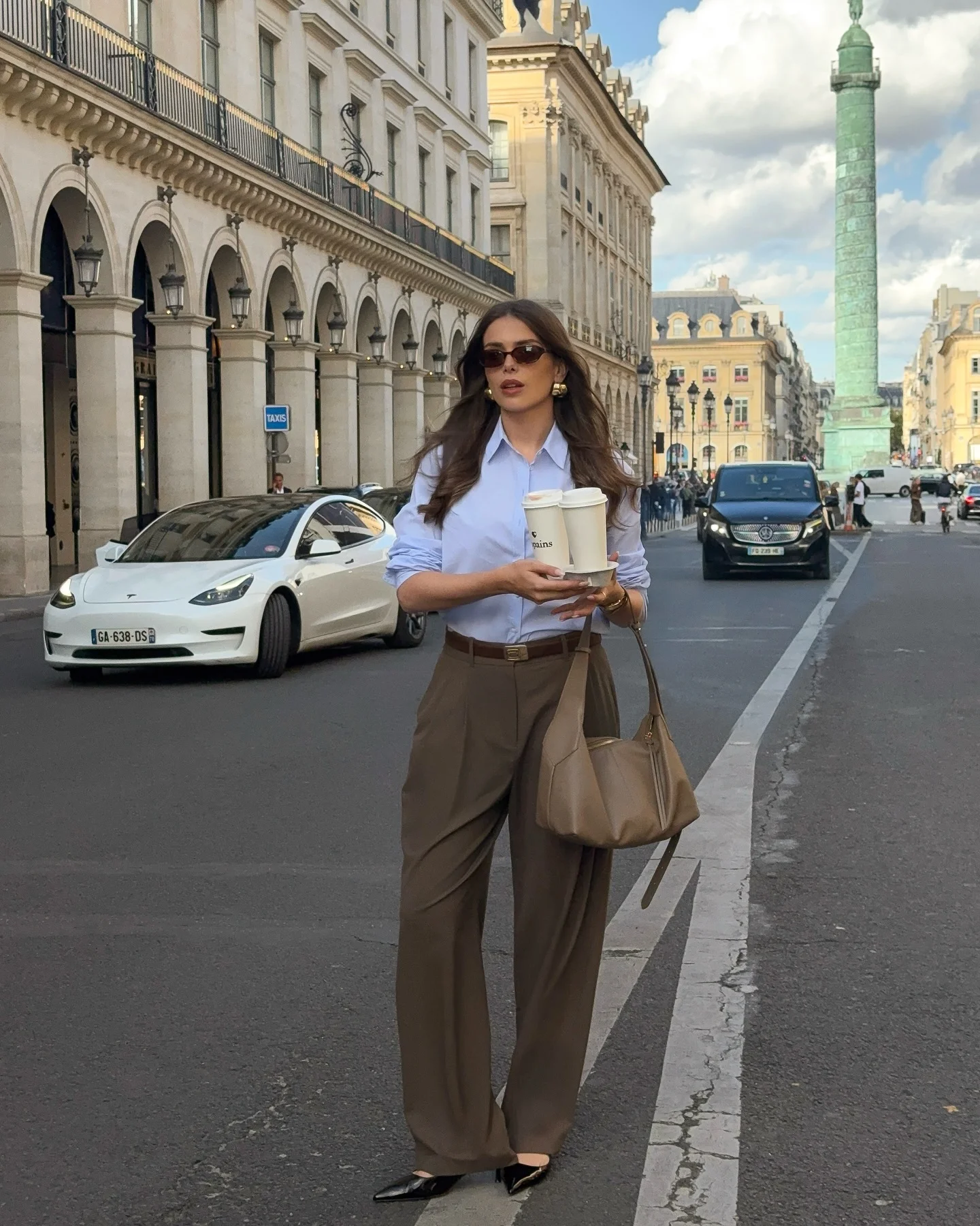 fall smart casual work outfit for women 2026 Blue Oxford Shirt With Flowing Chocolate Tailored Pants