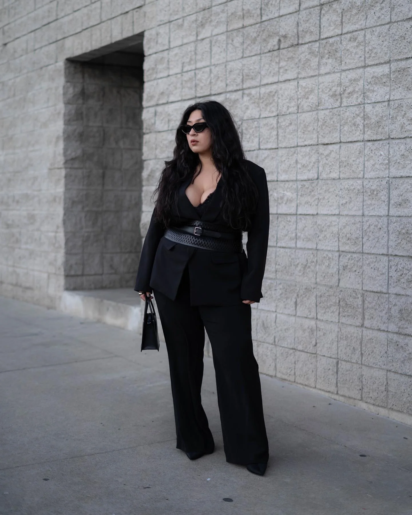 fall outfits for big busted women 2026 Tailored Black Suit With A Statement Waist Belt