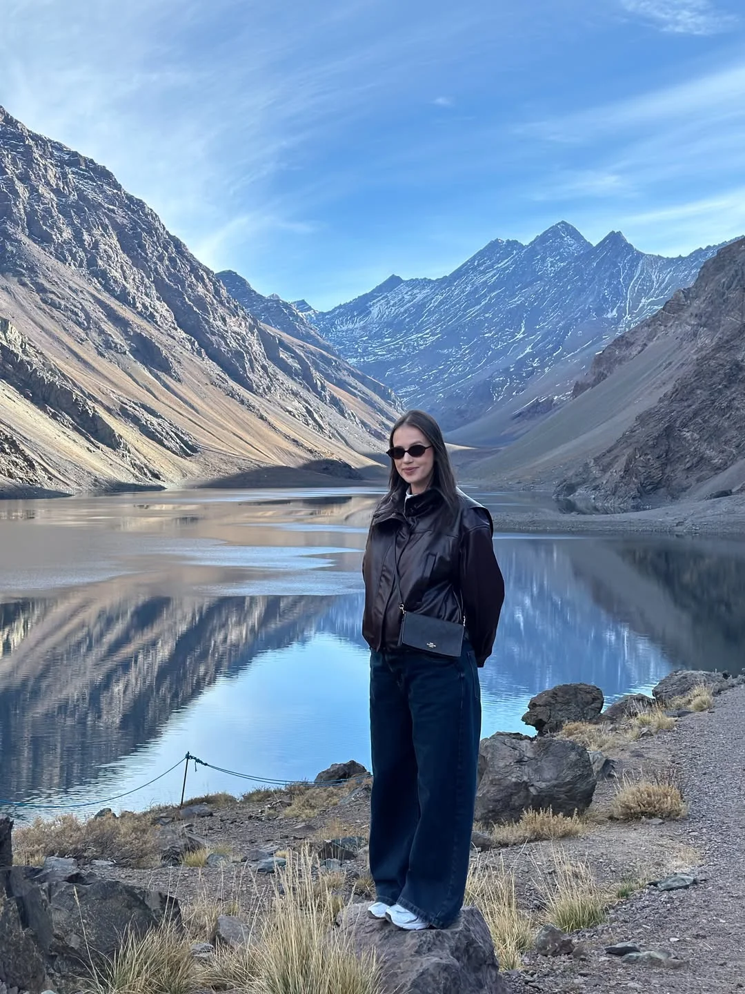 fall travel outfits for women 2026 Dark Denim And Leather For Elevated Adventure Travel