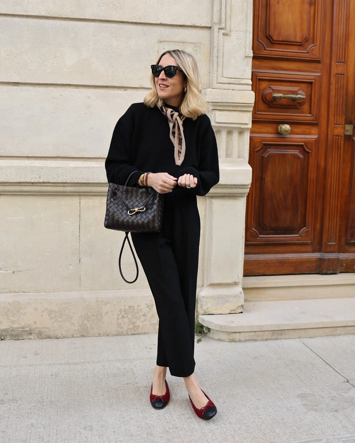 fall smart casual work outfit for women 2026 Relaxed Black Knit With Parisian Accessories