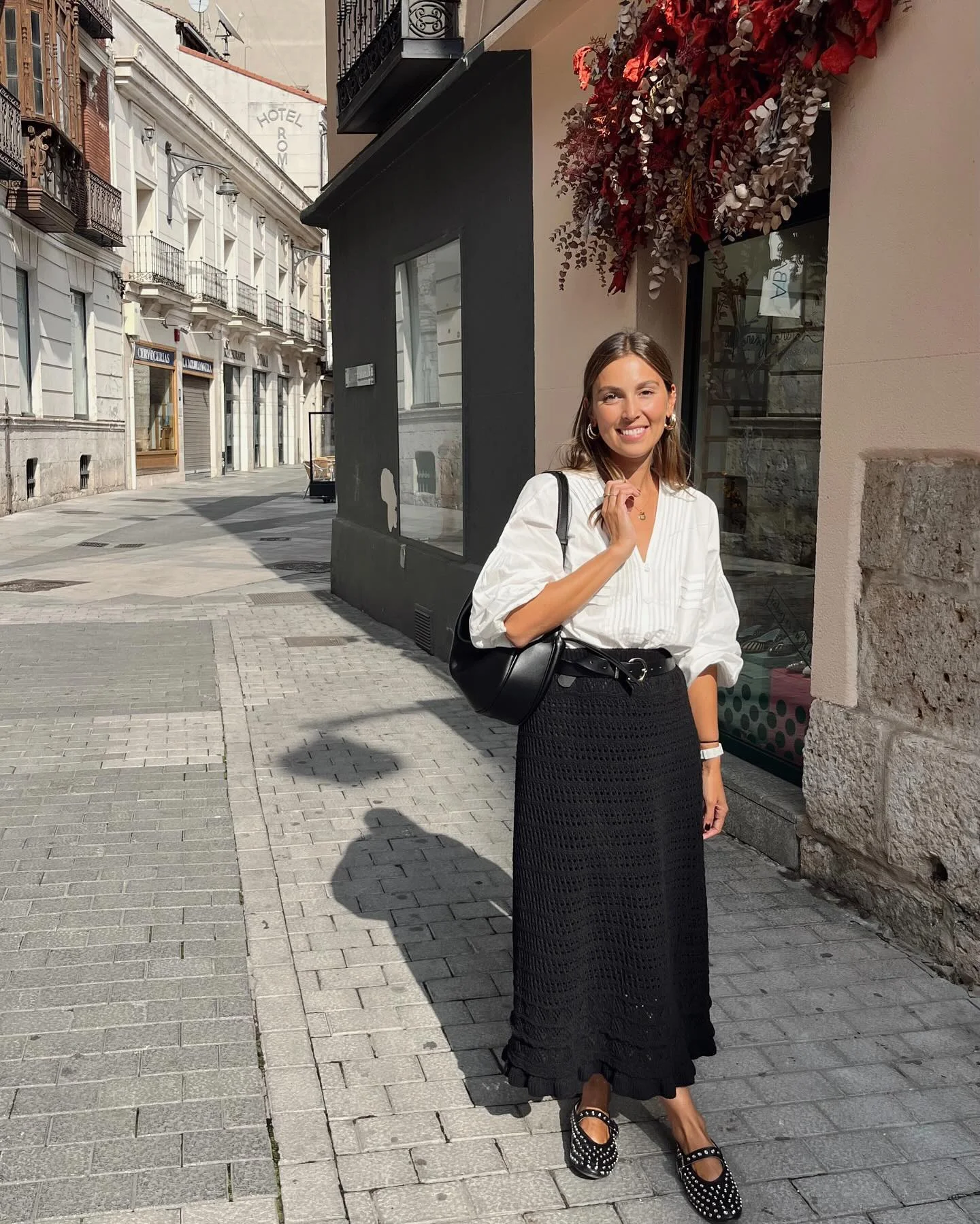 fall outfits with skirts 2026 Soft White Blouse Paired With A Textured Black Maxi Skirt