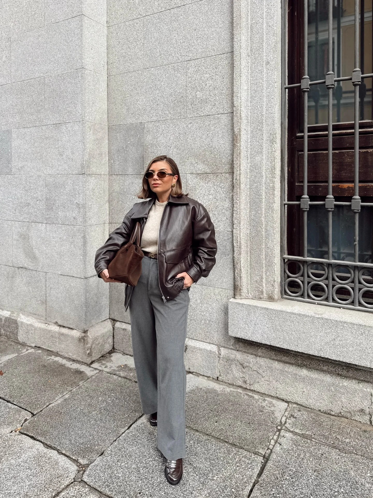 fall smart casual work outfit for women 2026 Chocolate Leather Jacket With Relaxed Tailored Pants