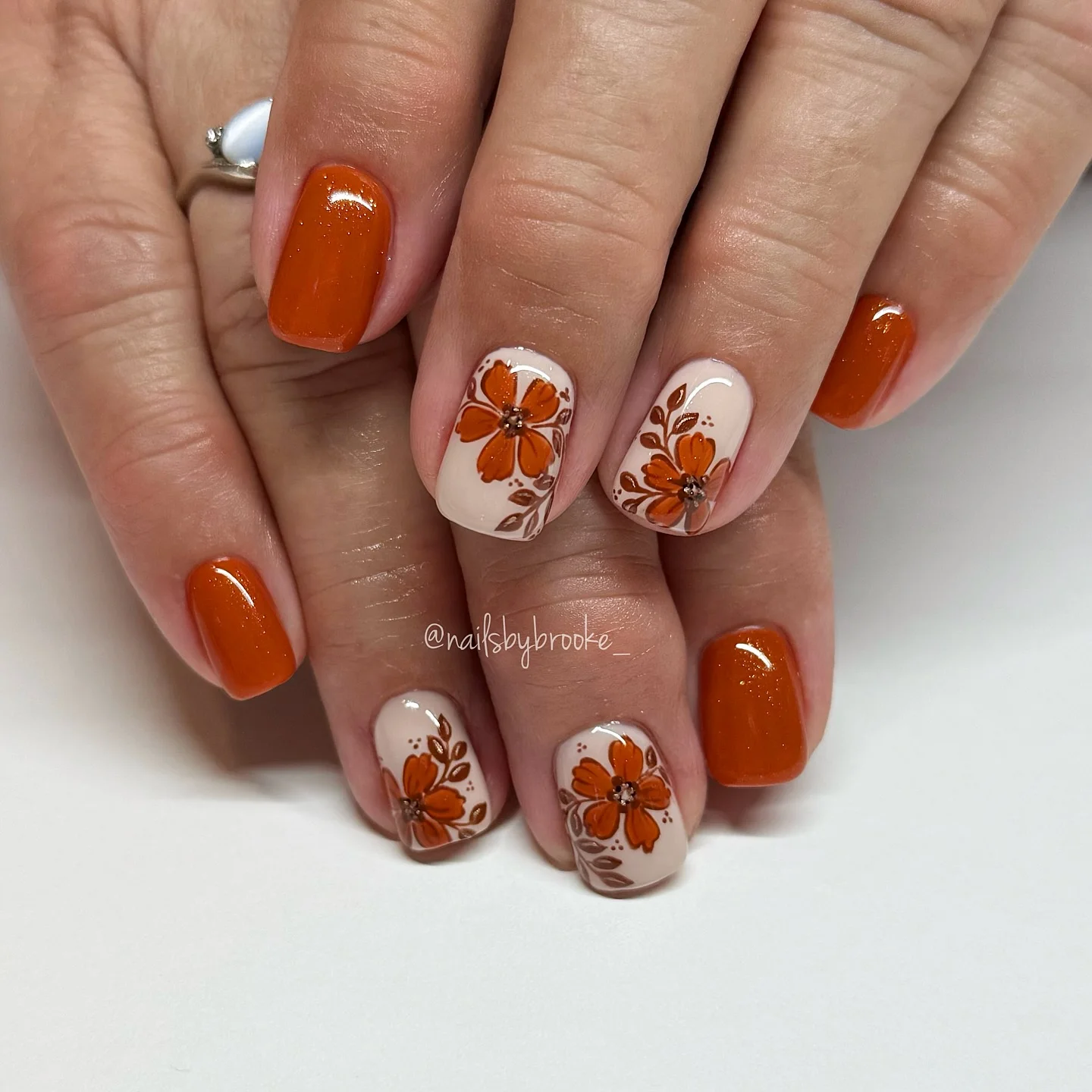 september nail art ideas 2026 Burnt Orange Floral Nails For A Warm September Transition