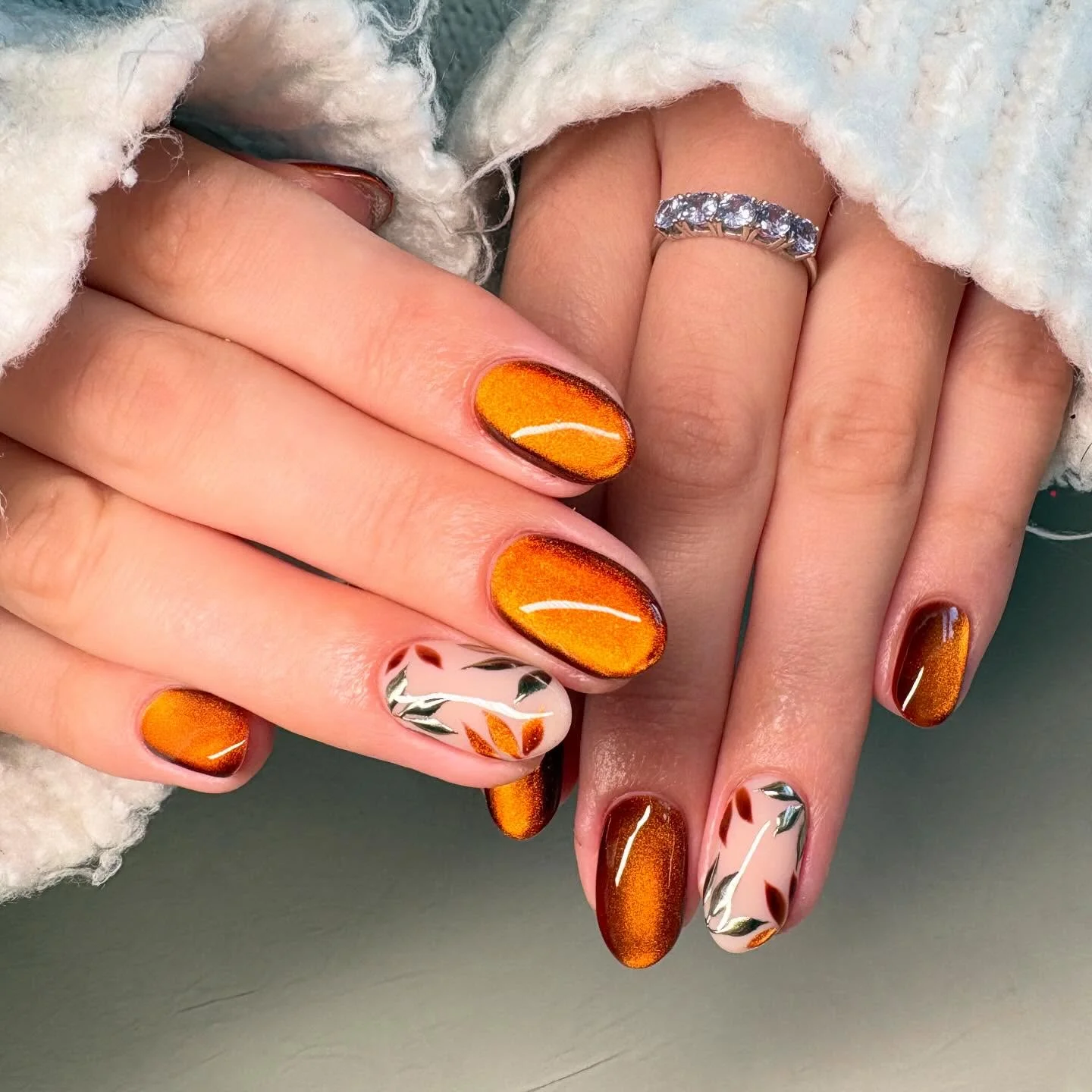 fall manicure 2026 Burnished Amber Chrome With Autumn Leaves