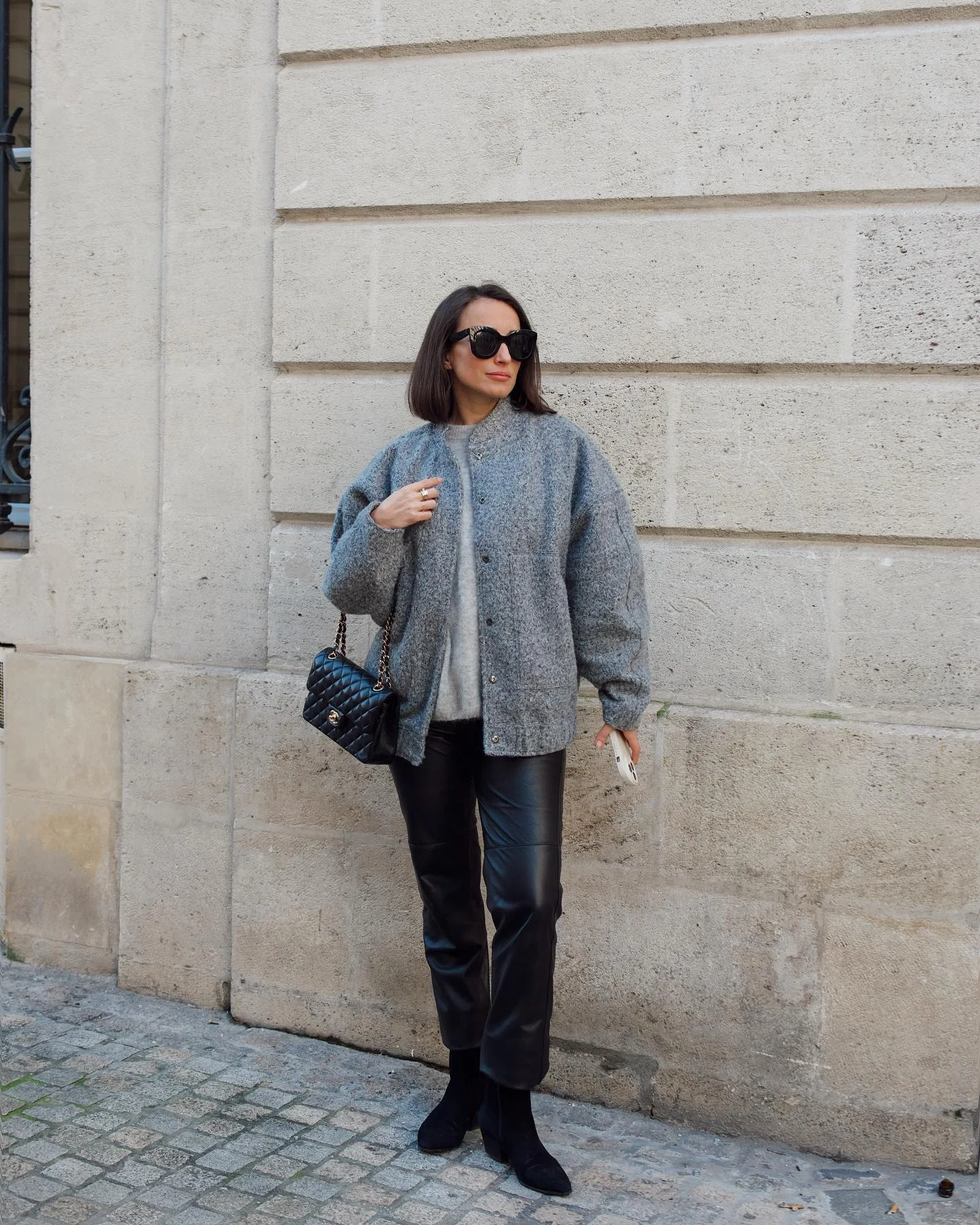 fall outfits with ankle boots 2026 Soft Gray Texture Meets Modern Black Leather