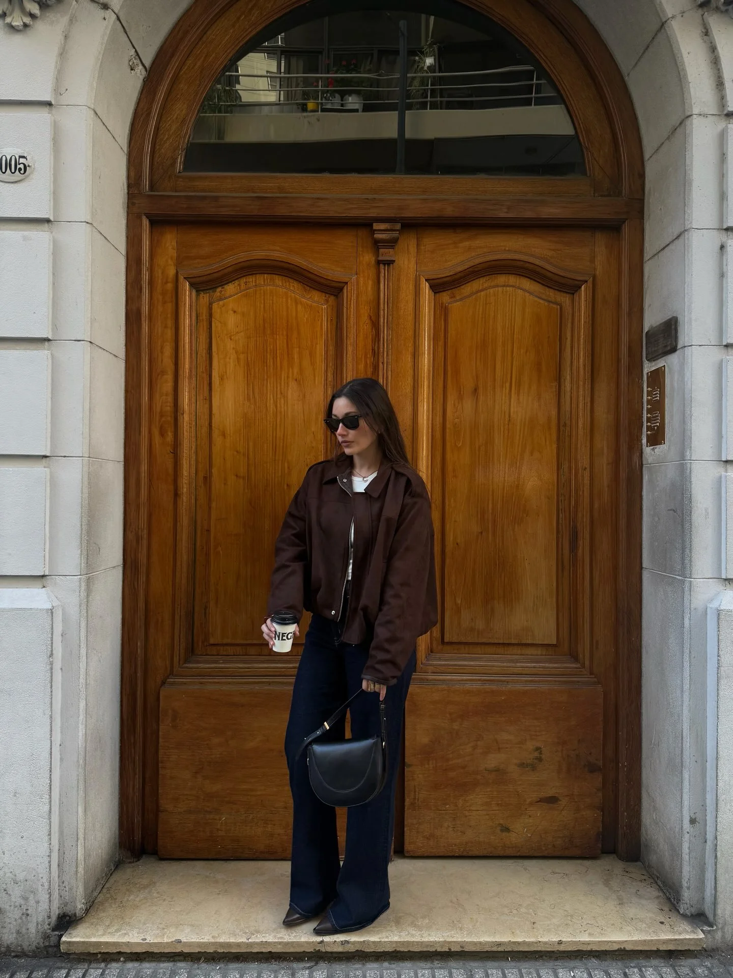 best fall outfits for women 2026 Rich Espresso Leather Jacket With Dark Wide-Leg Denim