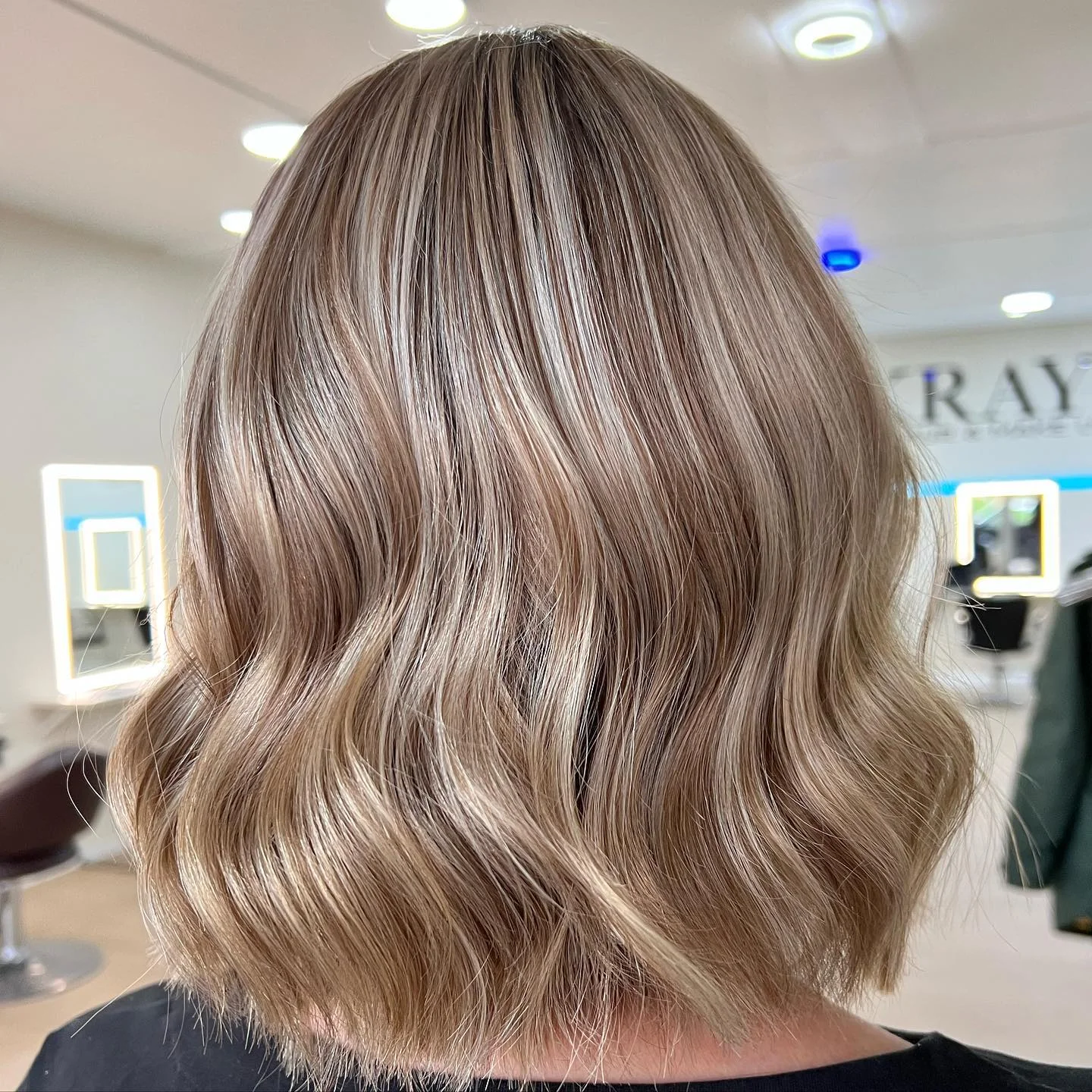 dirty blonde hair color Soft Wavy Bob With Smoky Dirty Blonde Dimension