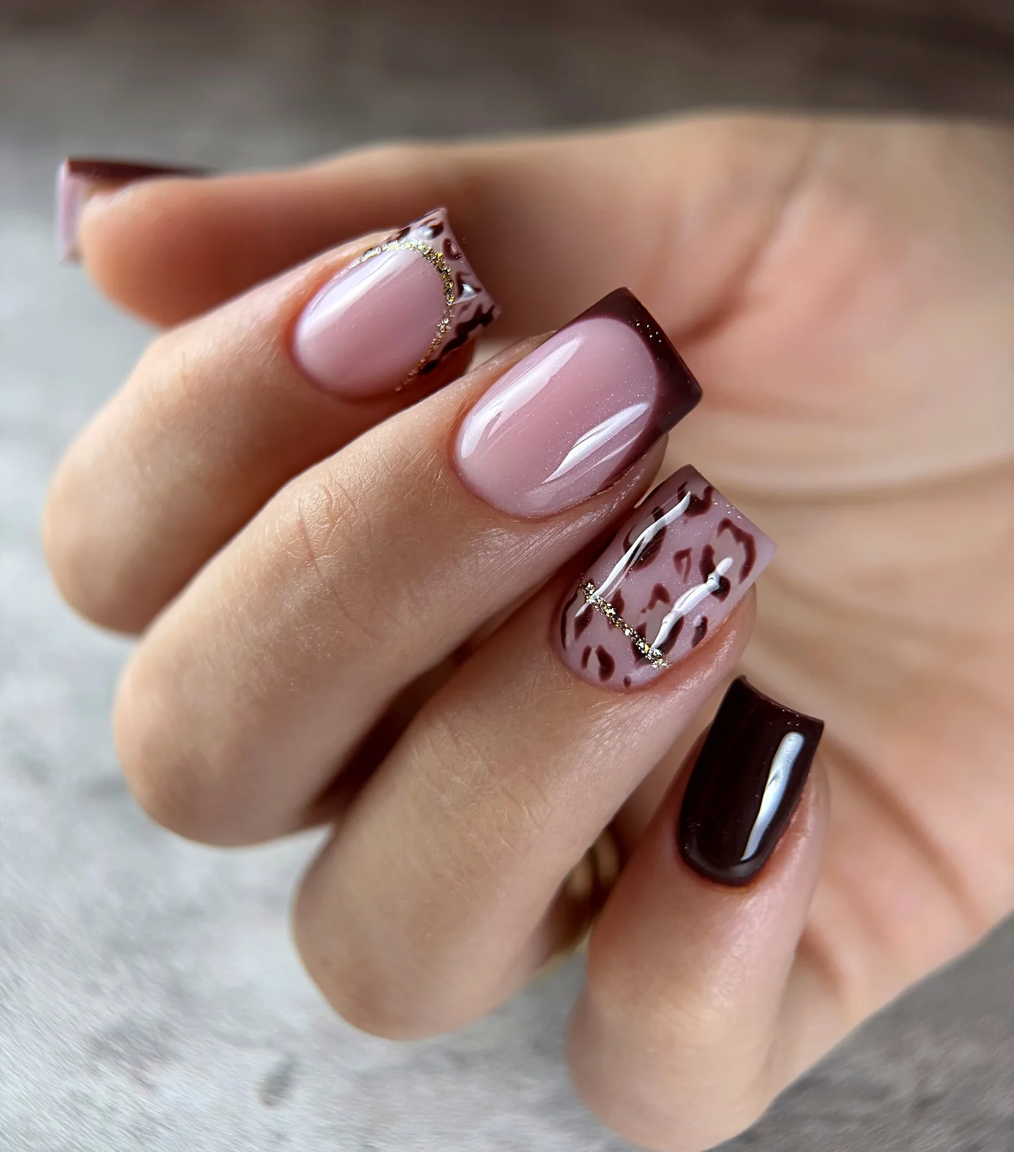 fall nail for all plates skin 2026 Chocolate French Tips With Delicate Leopard Accents