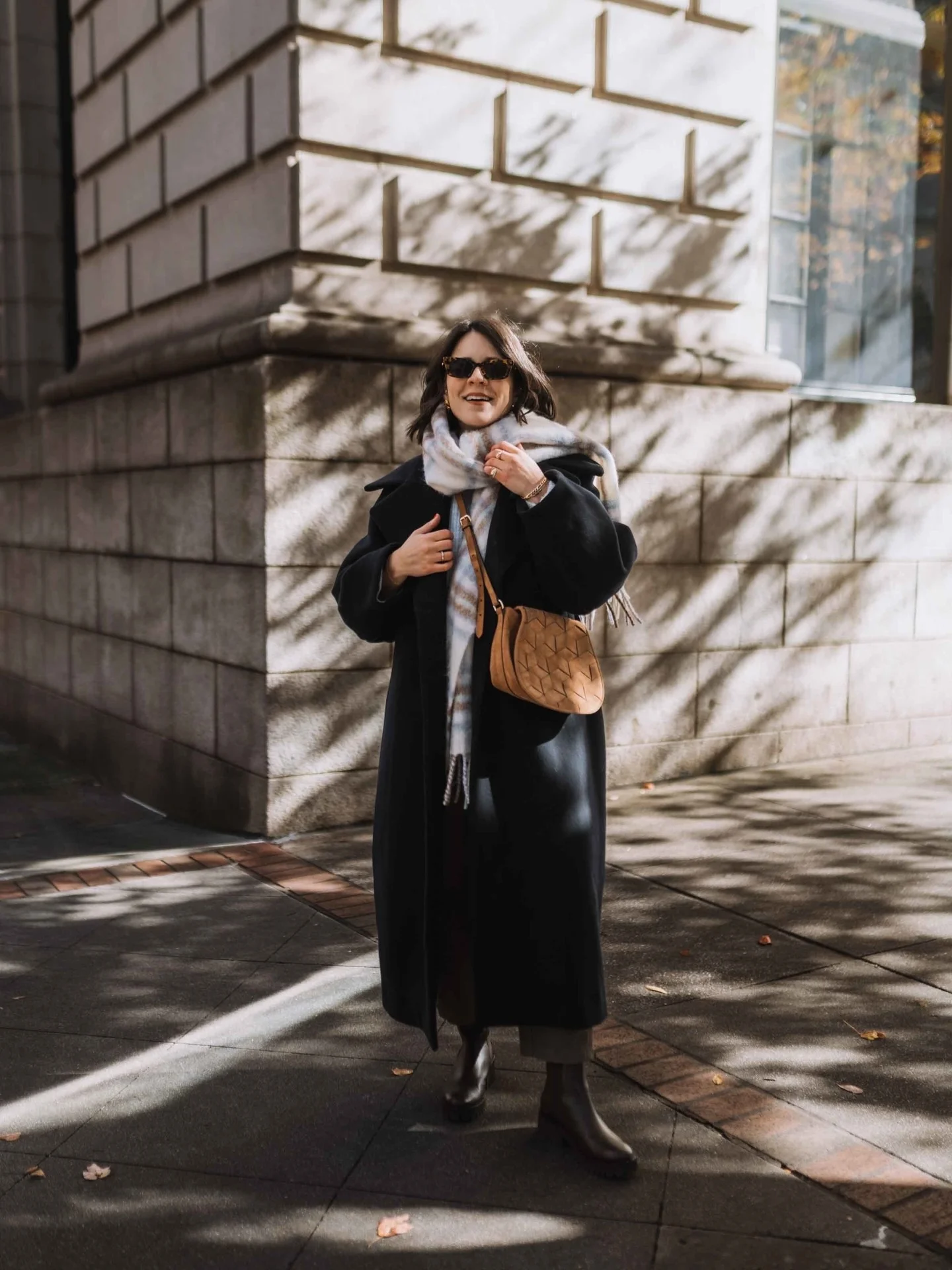 fall outfits with chelsea boots 2026 Elegant Long Coat And Chocolate Chelsea Boots For Crisp Fall Days