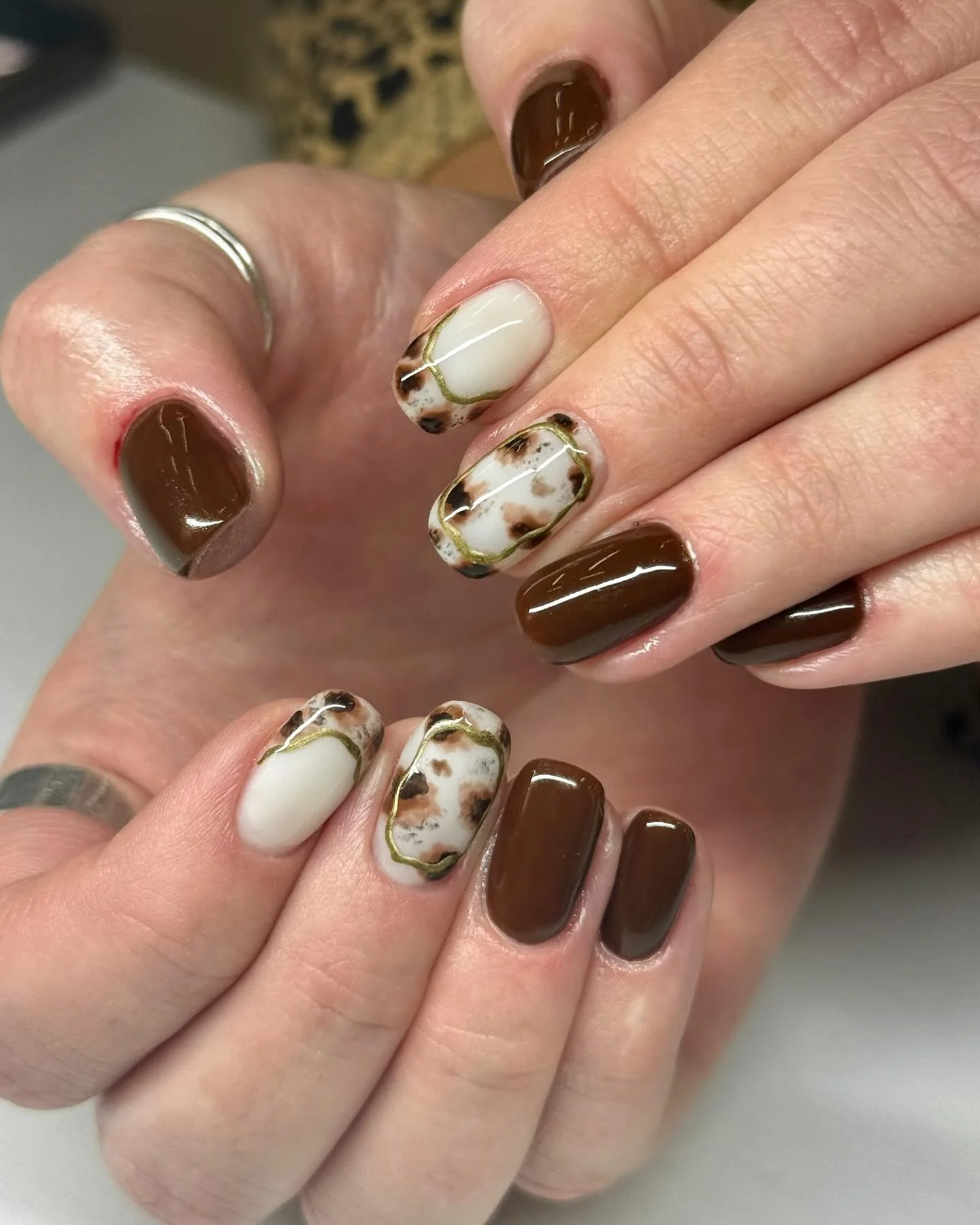 september nail art ideas 2026 Chocolate Marble Nails With Luxe Gold Accents