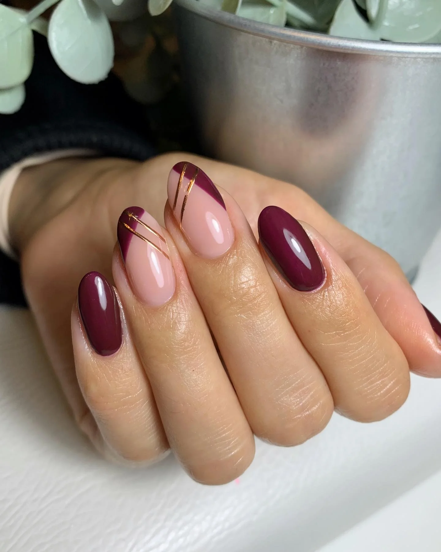 fall medium nail ideas 2026 Elegant Burgundy Diagonal French With Gold Lines