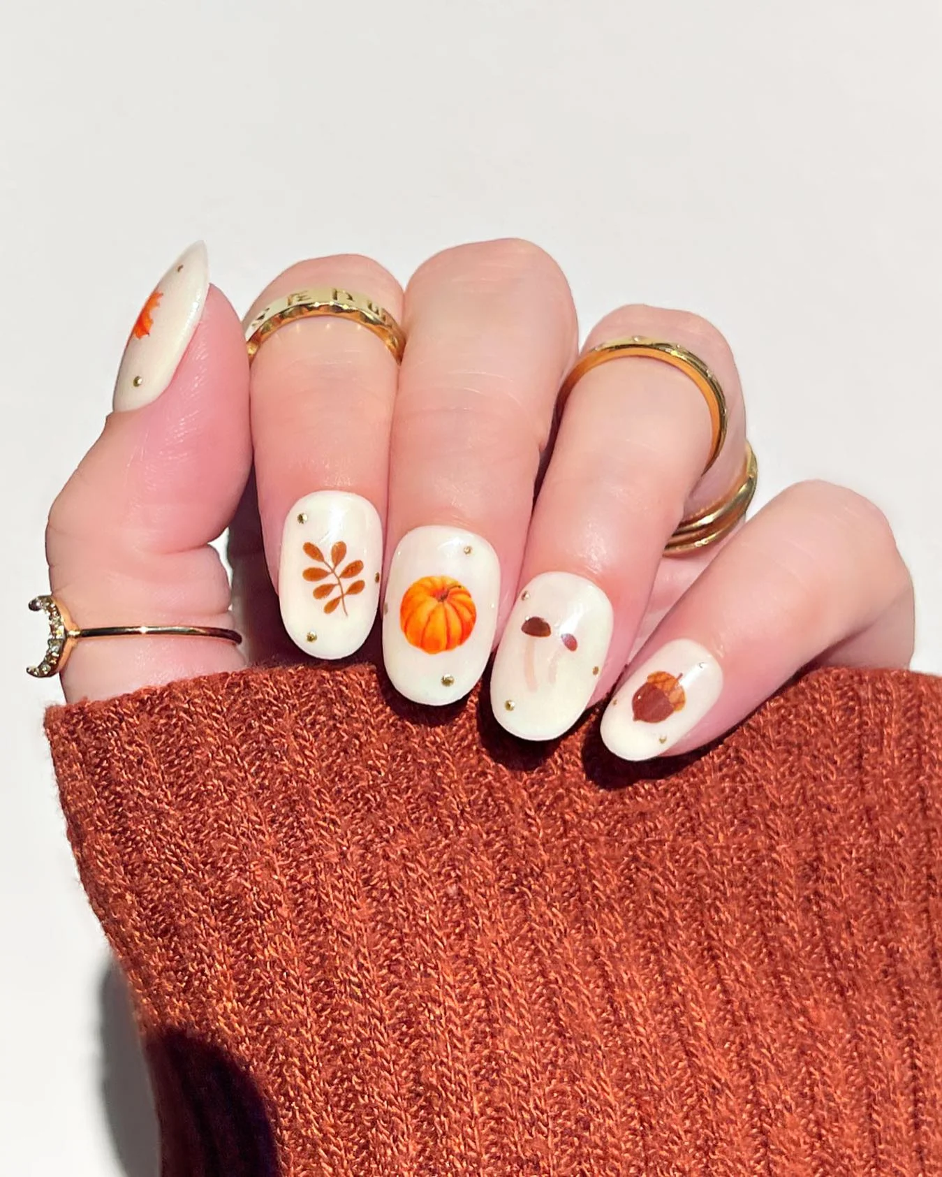 fall nail art 2026 Minimalist Harvest Icons On Cream Nails