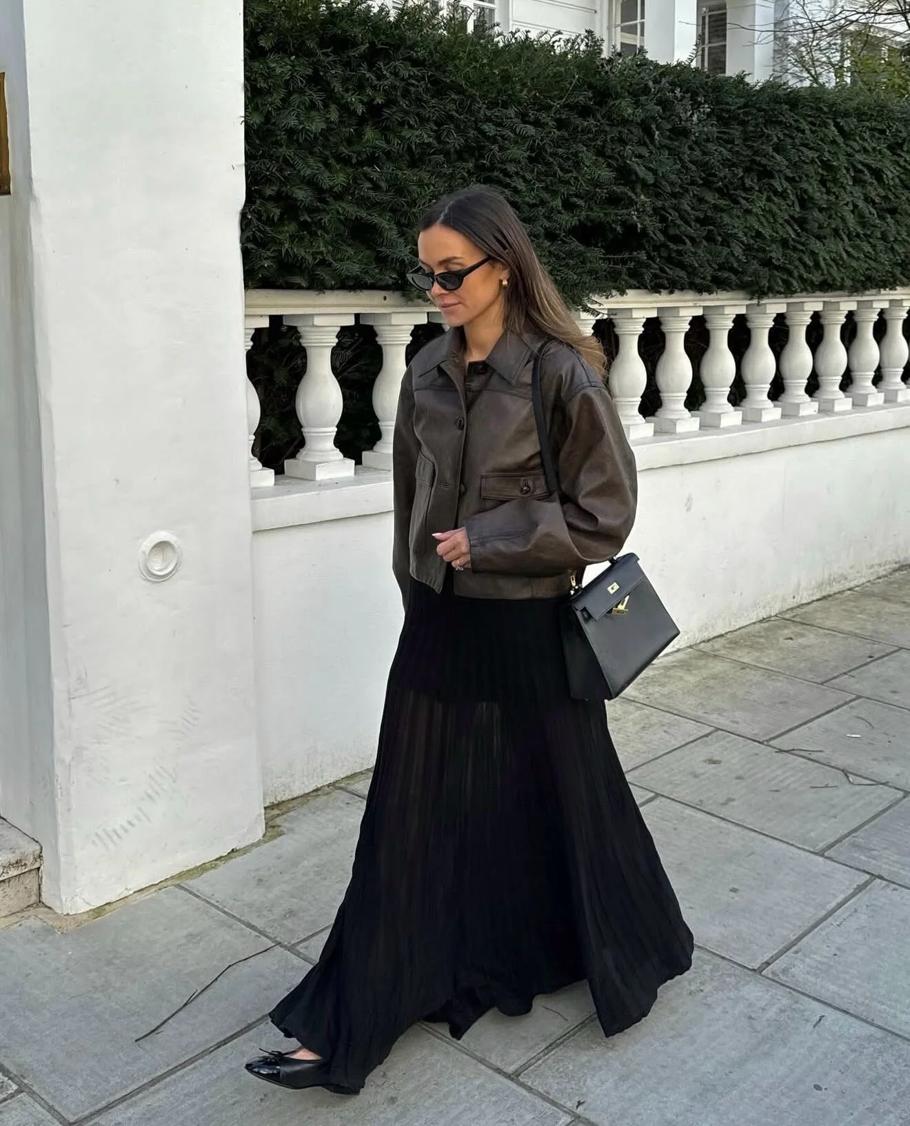 womens modest fall outfits 2026 Chocolate Leather Jacket With Flowing Black Maxi Skirt