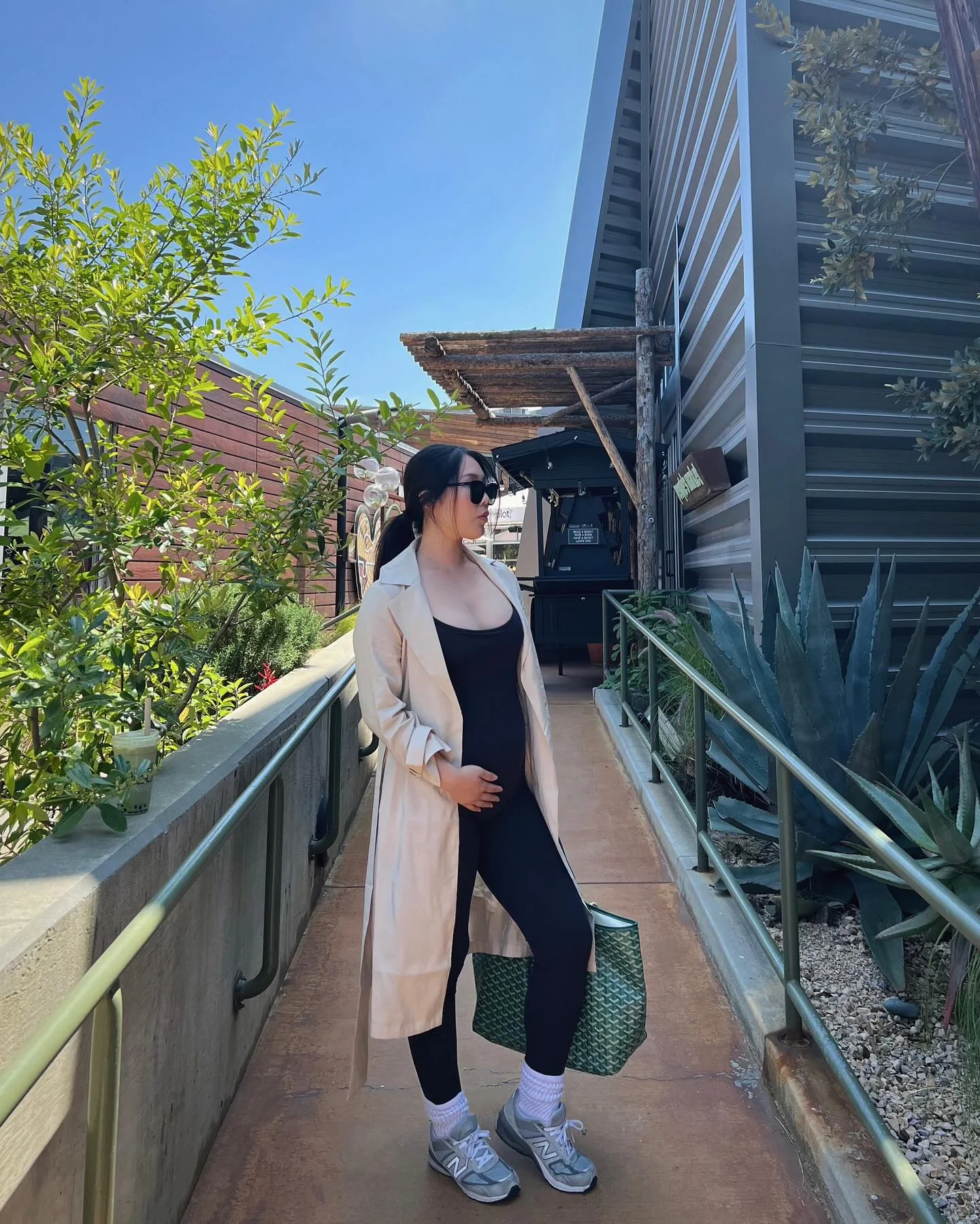 comfy pregnancy outfits for fall 2026 Relaxed Black Leggings With A Lightweight Trench Coat