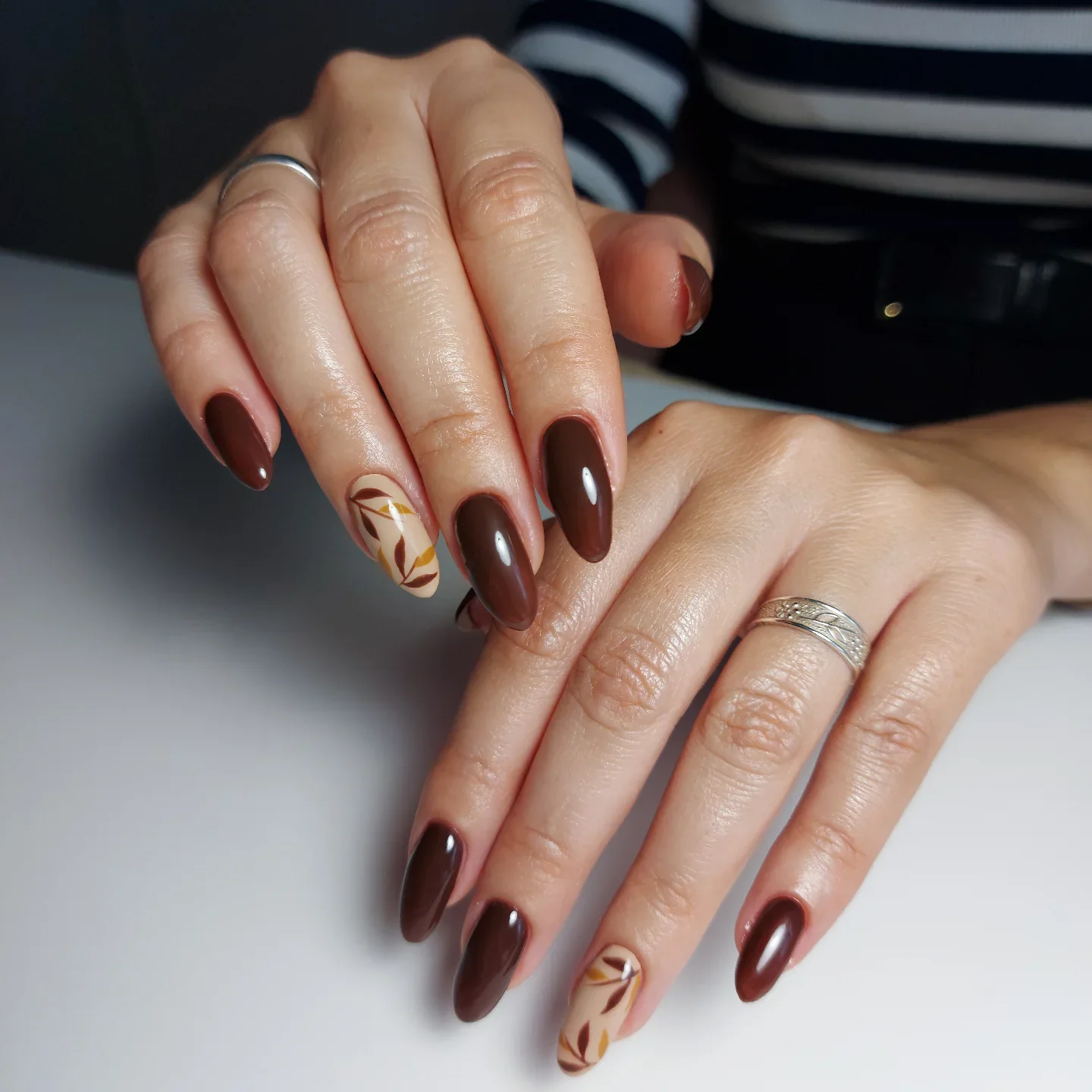 fall manicure 2026 Classic Chocolate Brown Nails With Minimal Leaf Art