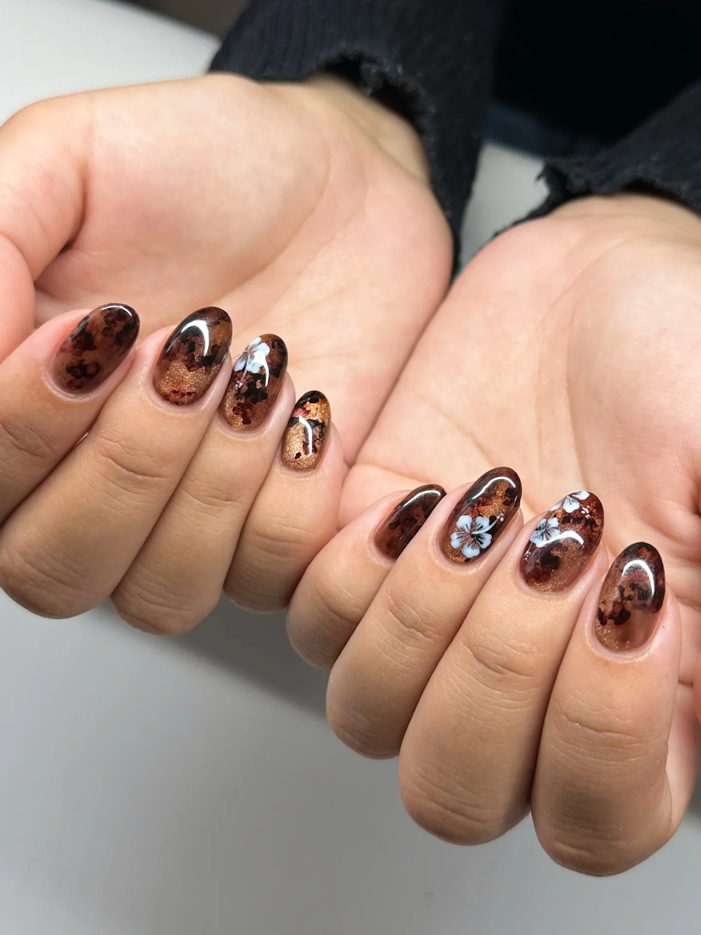 fall medium nail ideas 2026 Smoky Tortoiseshell Florals With Copper Shimmer