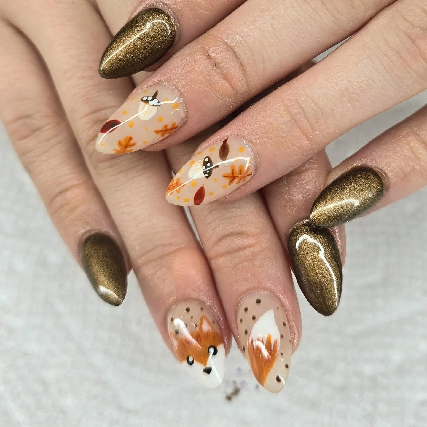 fall manicure 2026 Golden Metallic Autumn Nails With Whimsical Forest Details