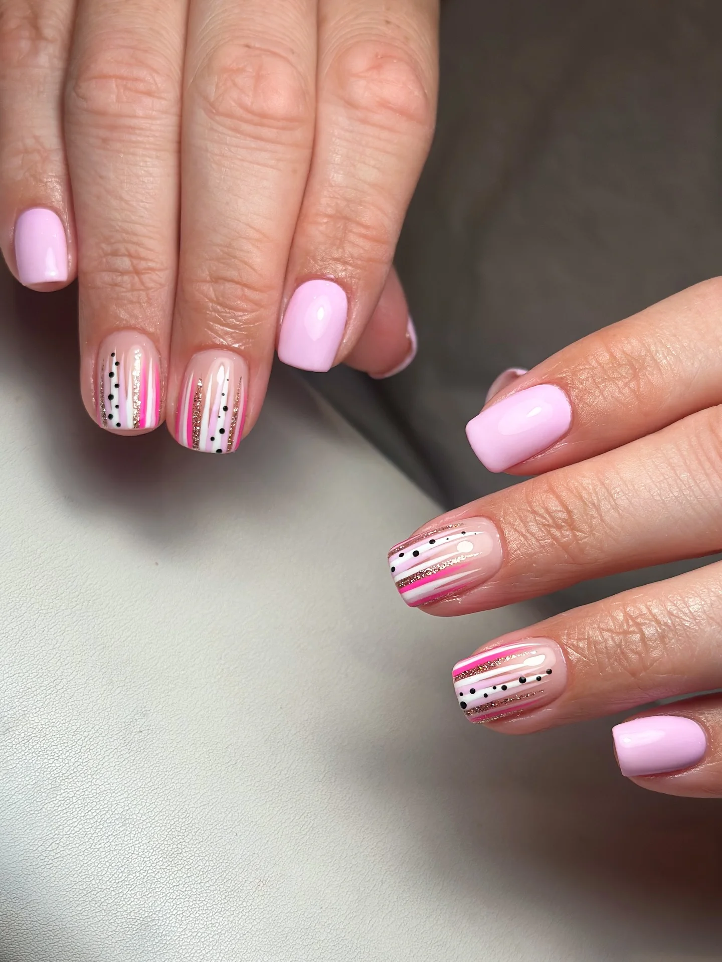nail designs for august 2026 Minimal Pink Stripe Nails With Modern Graphic Details