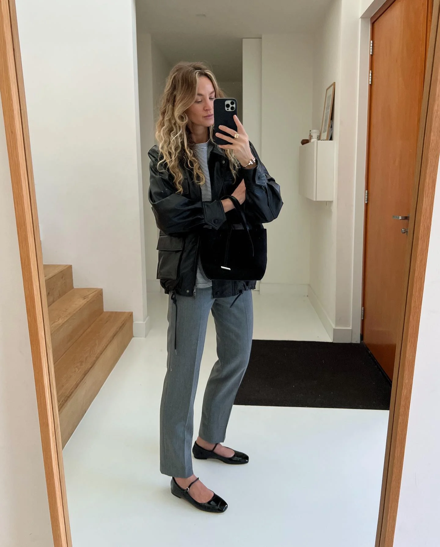 autumn casual work outfits for women 2026 Relaxed Leather Jacket Styling With Tailored Gray Pants