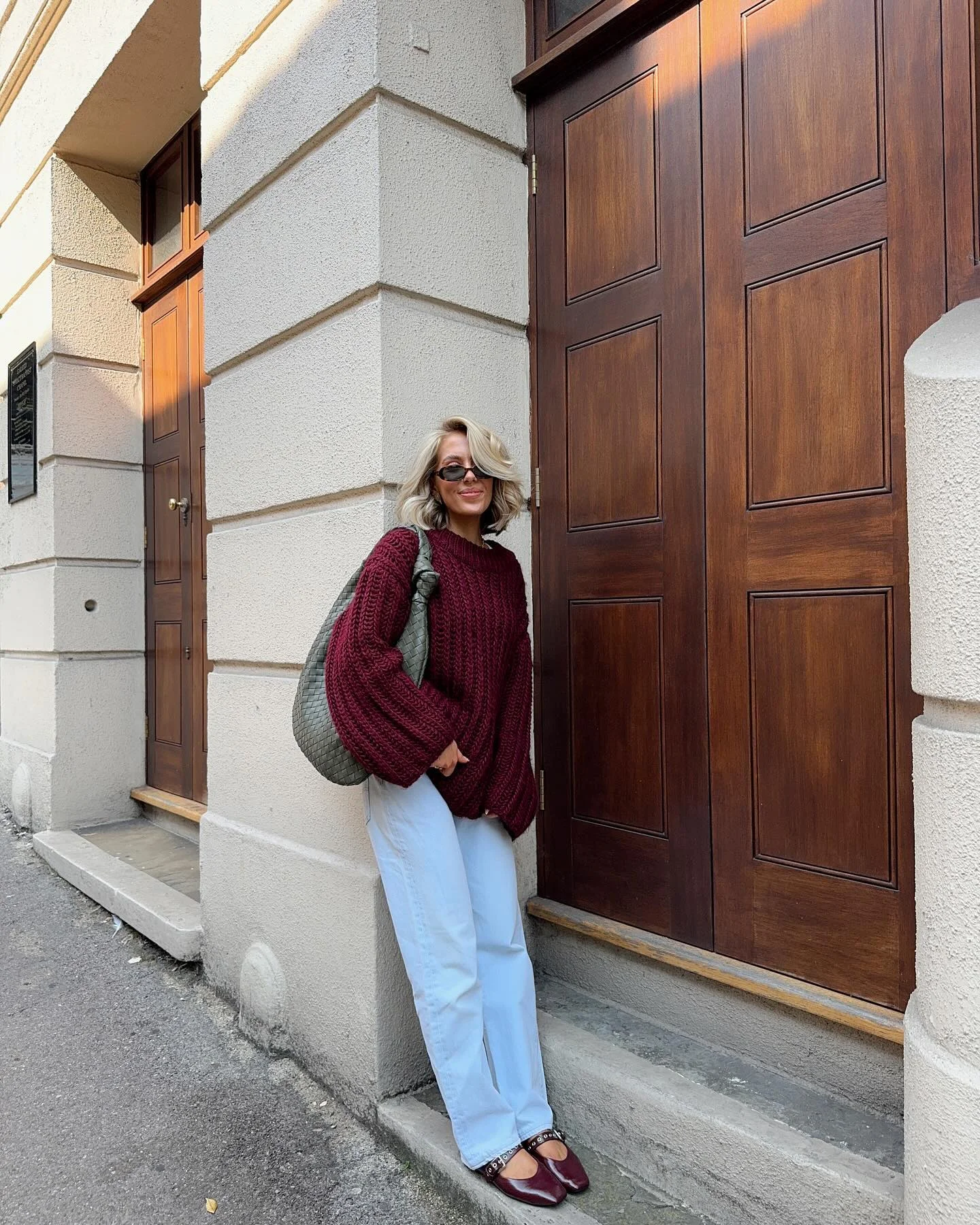 comfy fall outfits for lazy days 2026 Oversized Burgundy Knit With Relaxed White Denim