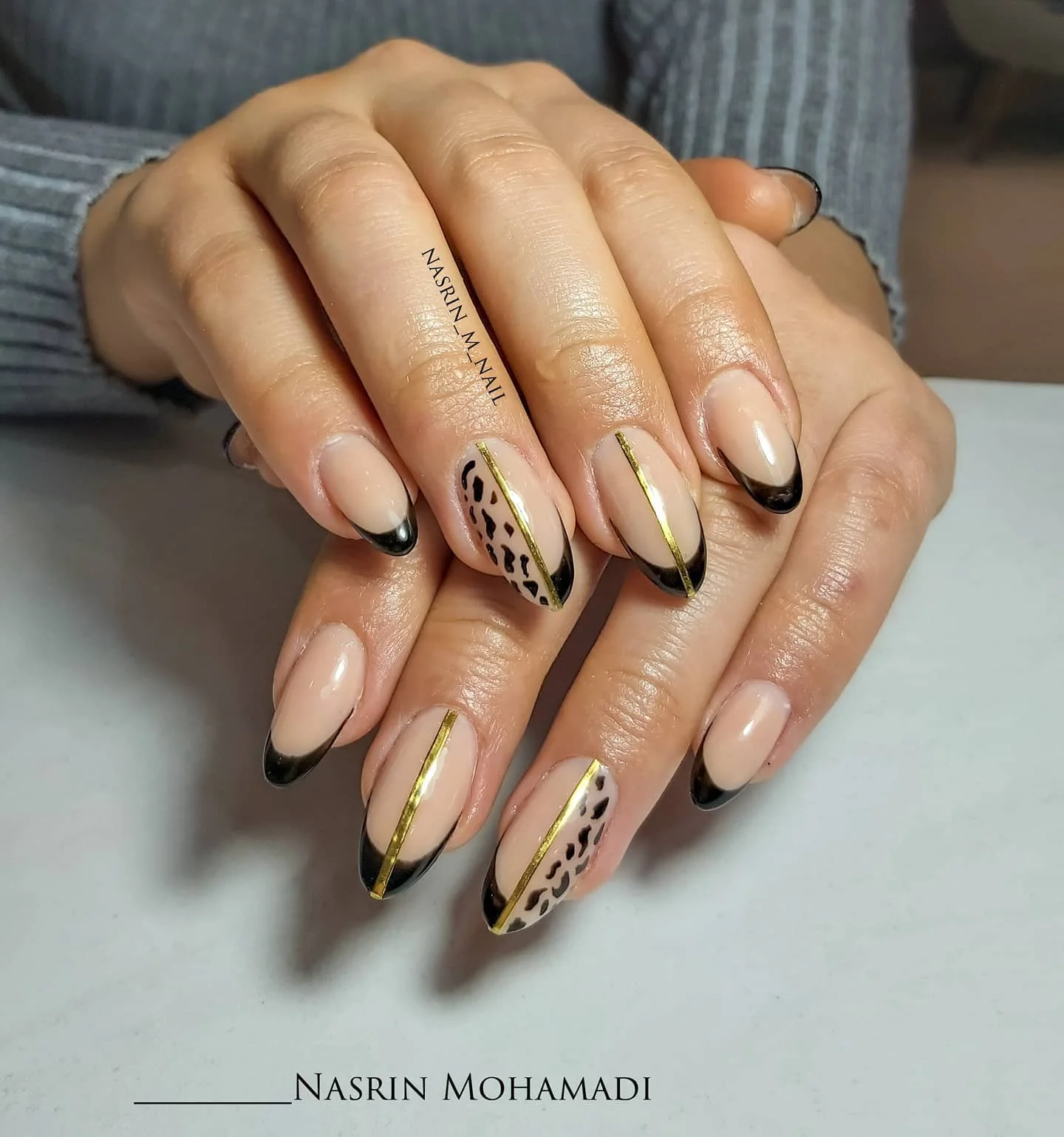 fall acrylic nails 2026 Chic Leopard Accent Almond Fall Nails