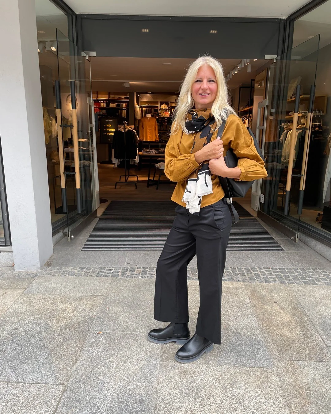 fall outfits with chelsea boots 2026 Mustard Blouse And Black Chelsea Boots For Modern Everyday Dressing