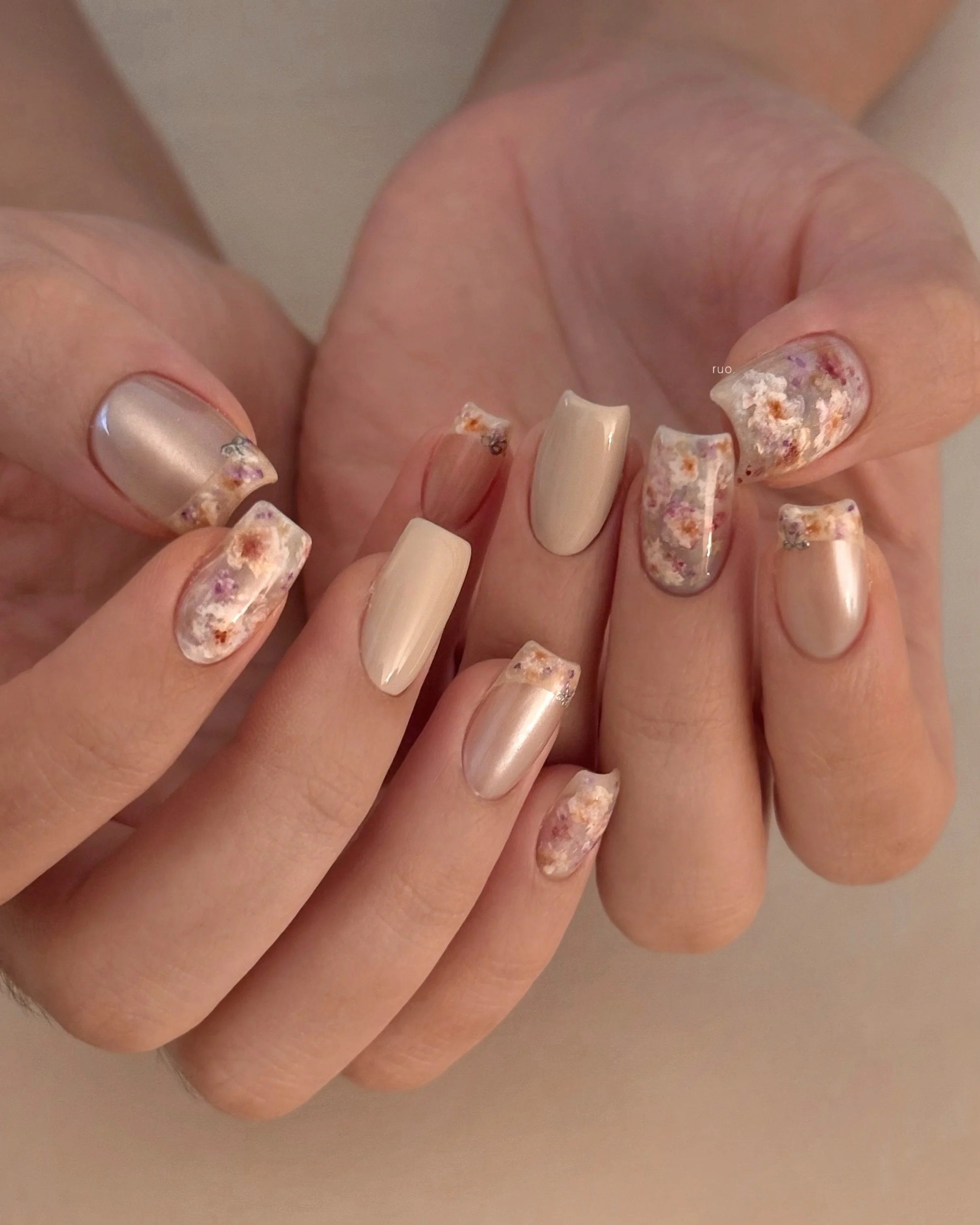 fall acrylic nails 2026 Pearlescent Floral Texture In Soft Neutral Tones