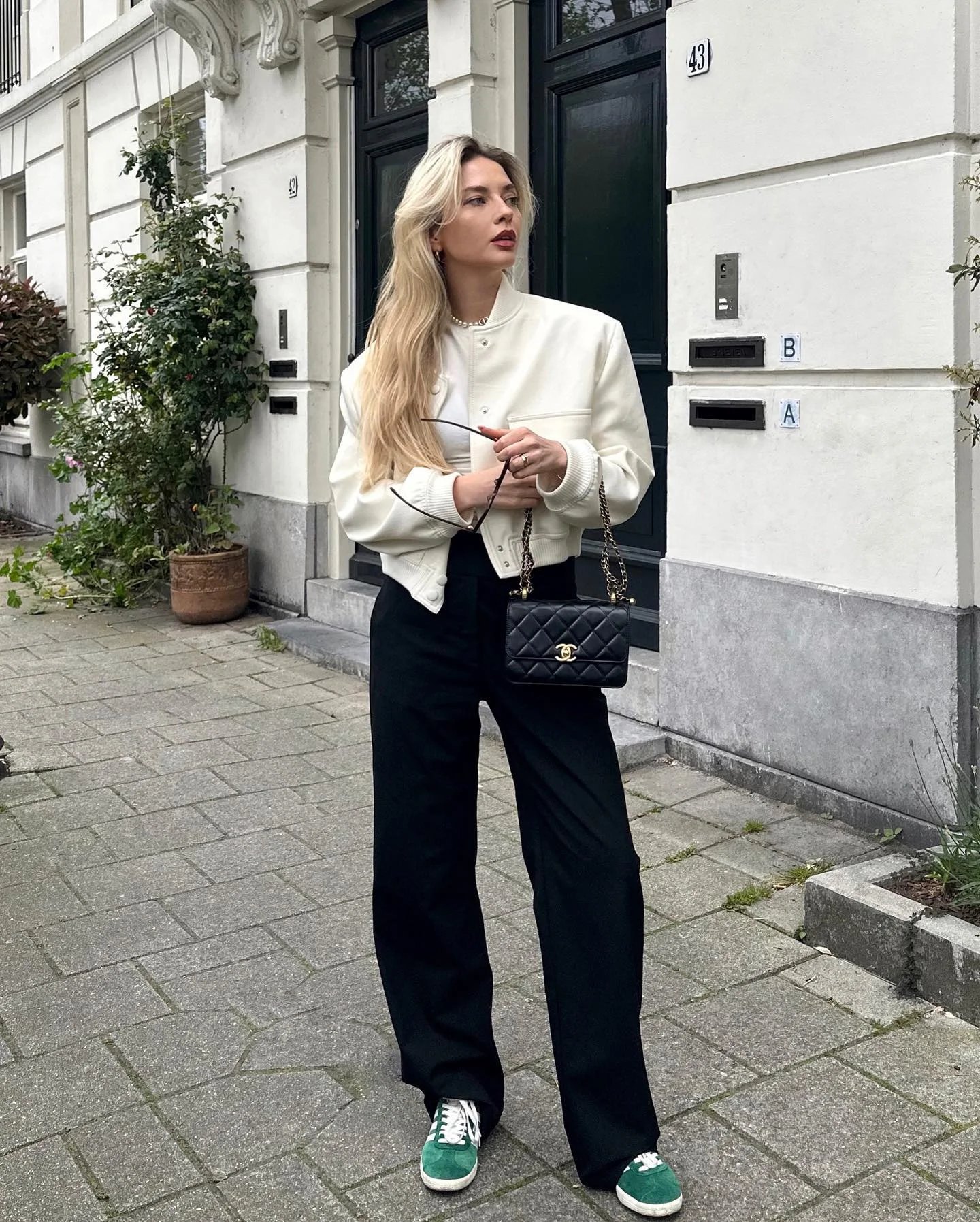 best fall outfits for women 2026 Sporty Elegance With A Cream Bomber Jacket