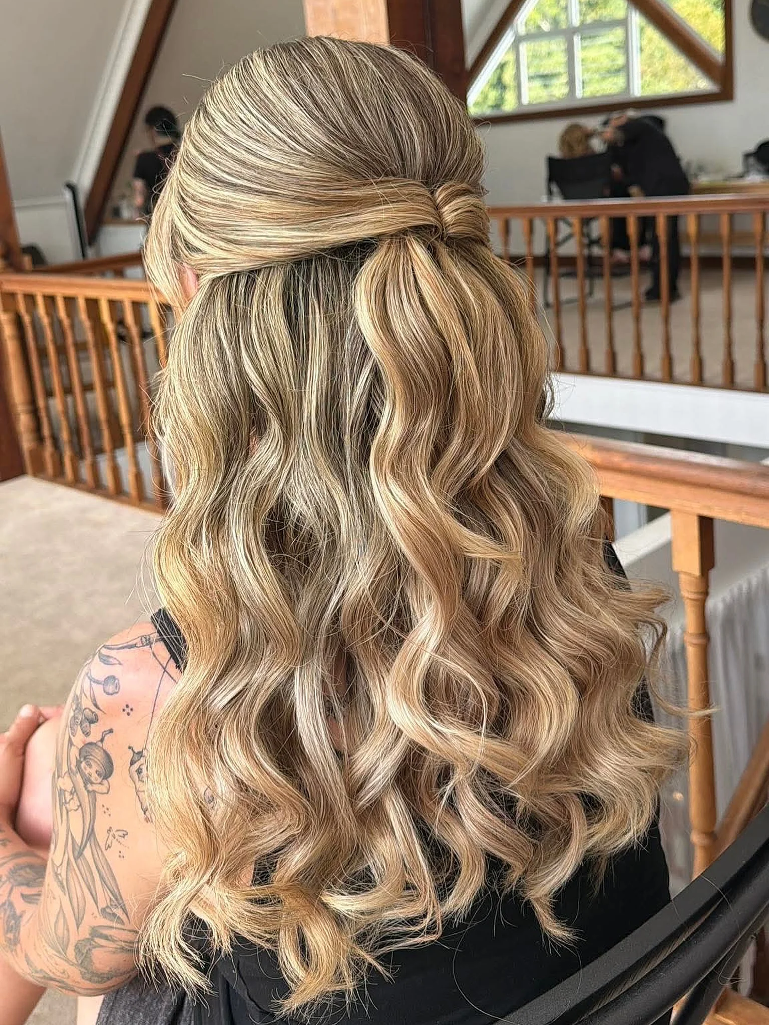 body waves hairstyle Soft Blonde Half-Up Waves With Romantic Texture