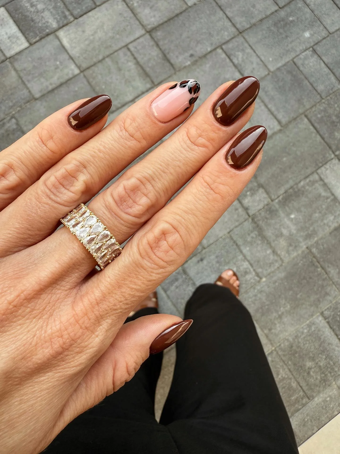 fall medium nail ideas 2026 Chocolate Gloss With Minimal Floral Accent