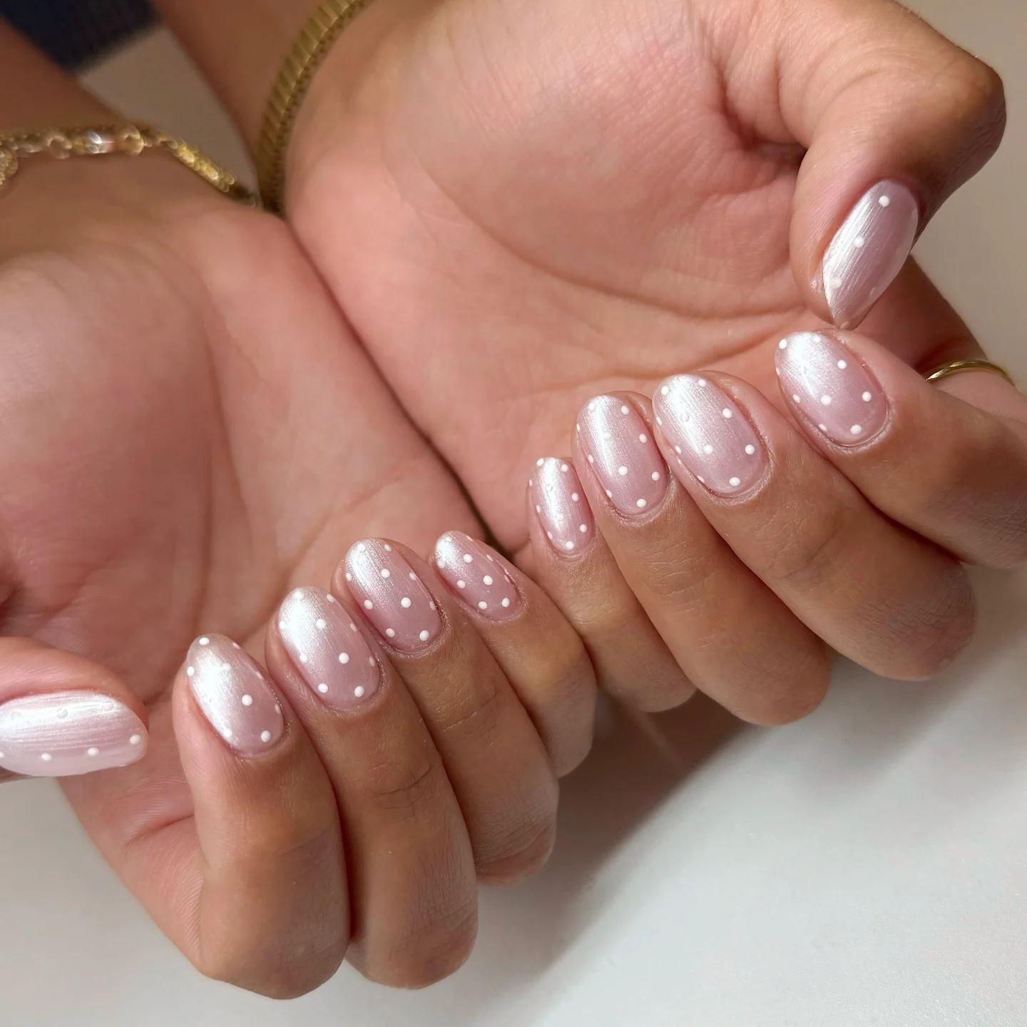 nail designs for august 2026 Soft Pearl Glazed Nails With Delicate Polka Dots