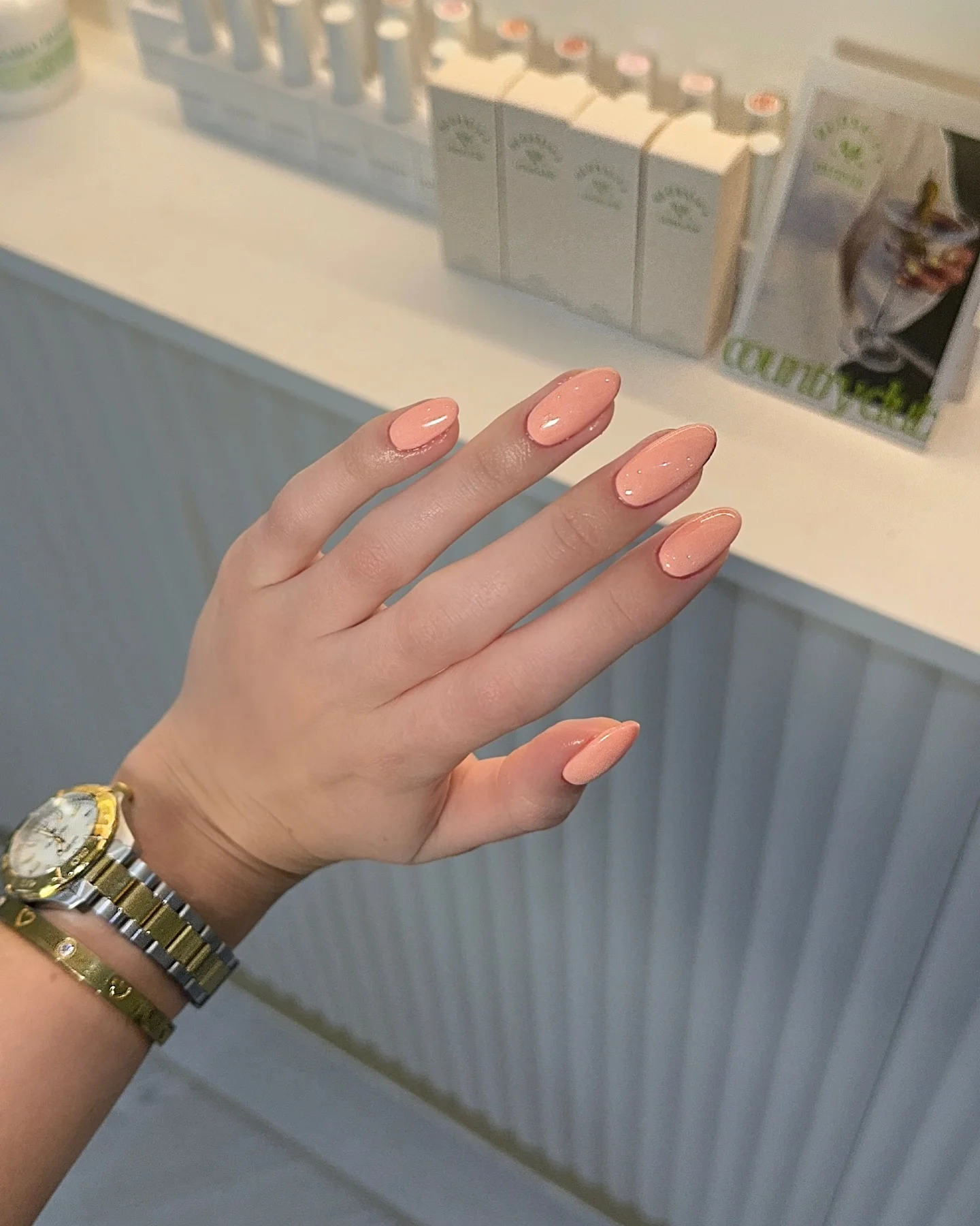 best nail colors for august 2026 Elegant Peach Almond Nails With A Soft Glow