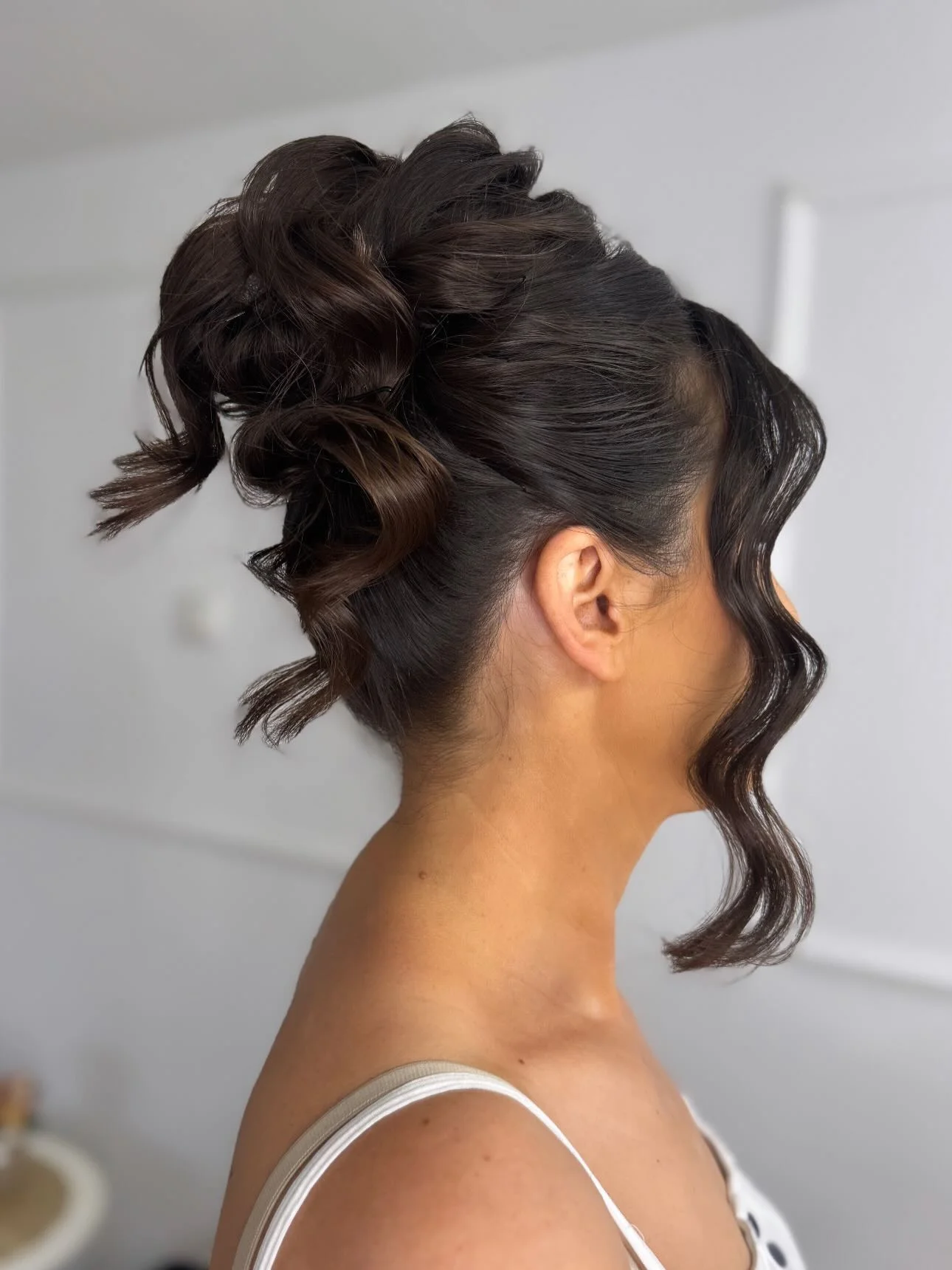 body waves hairstyle Elegant Textured Updo With Face-Framing Waves