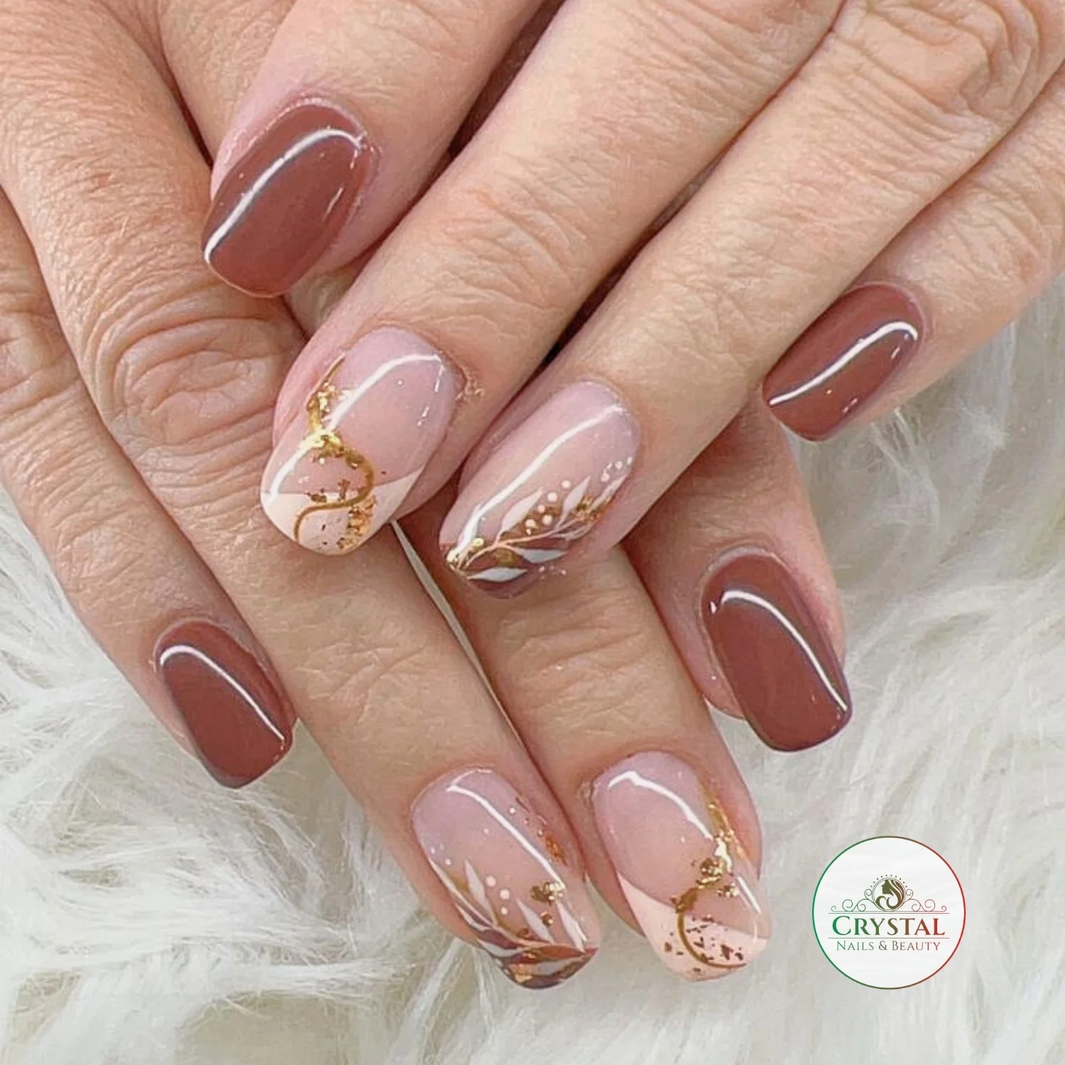 september nail designs 2026 Soft Mocha Botanical Nails With Gold Details